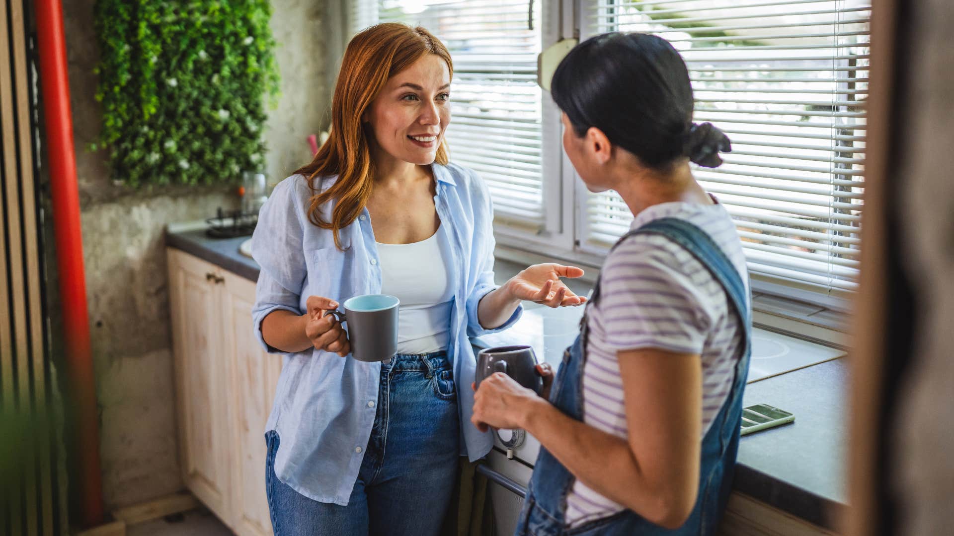 woman in blue jacket smiling and say let me know if you need help getting started to friend