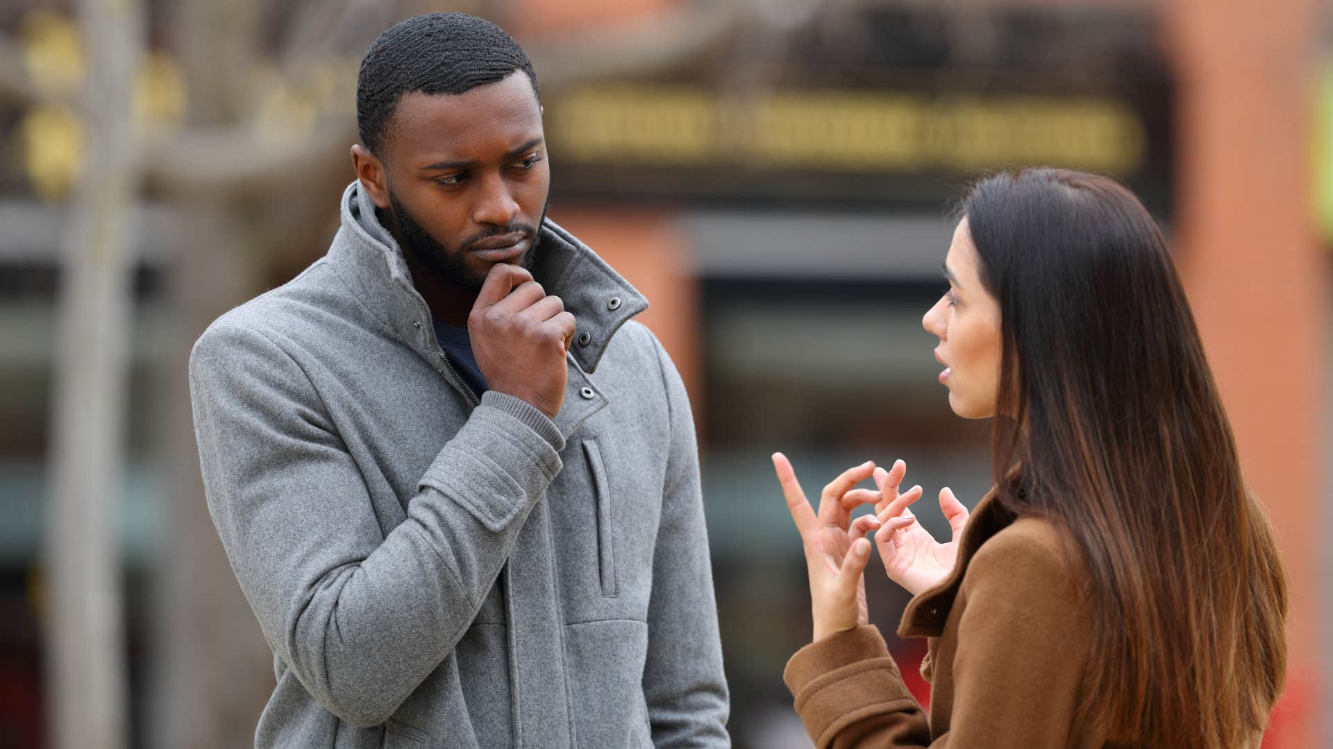 woman telling man maybe another time out in public