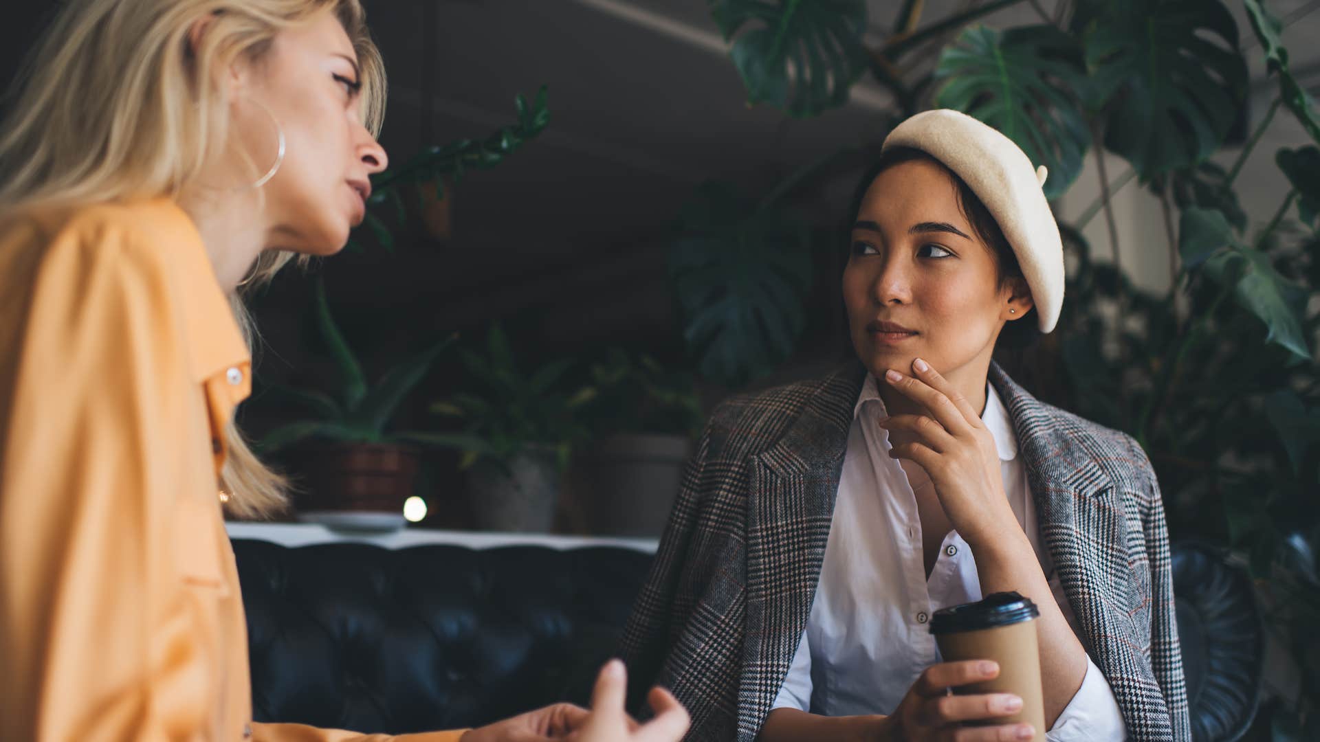 woman being fake nice telling friend youre actually pretty smart