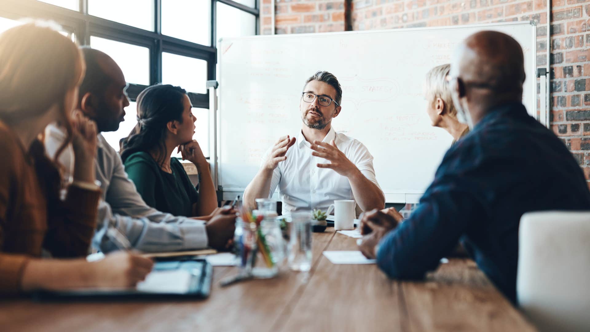 man who is verbalizing ideas when he realized working hard isn't enough