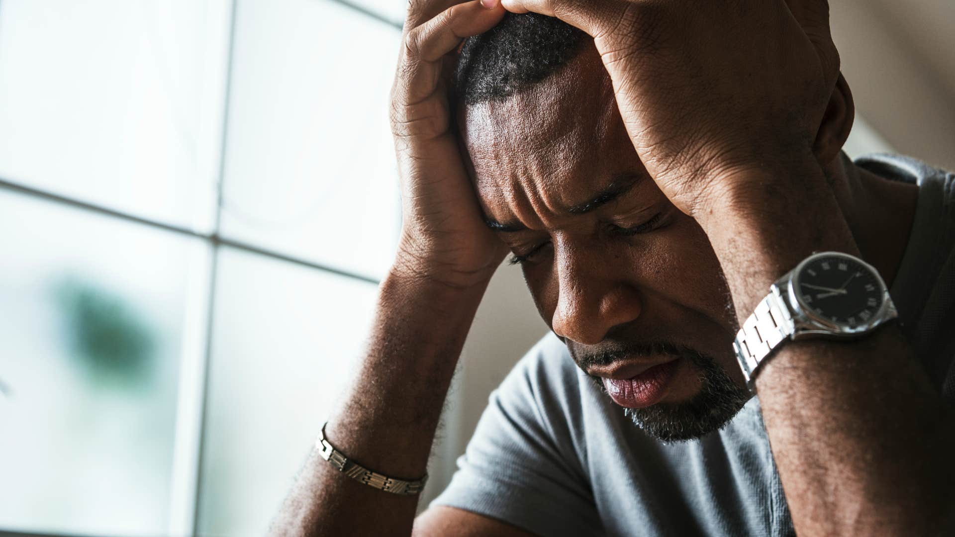 Upset man putting off personal growth and development.