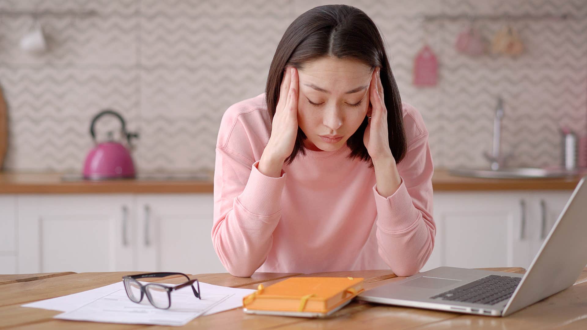 Woman who hates taking a break working at home.