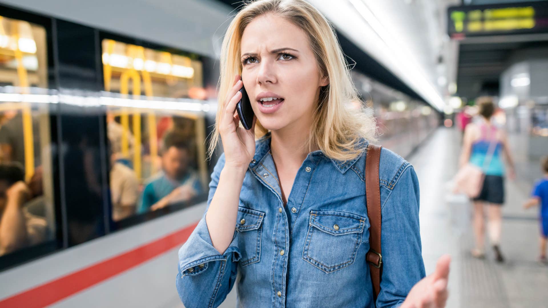 Woman arguing about people with no self-awareness on the phone.