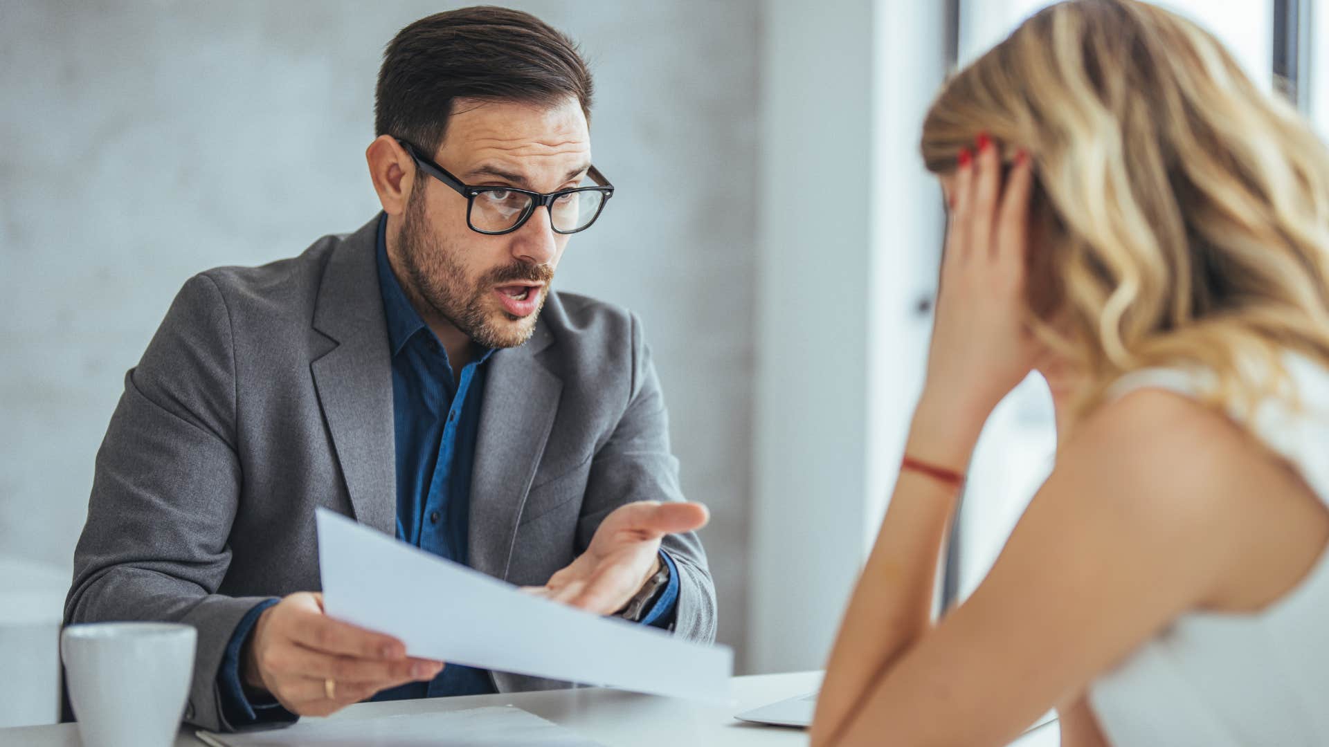 Boss arguing with a woman about toxic workplaces.