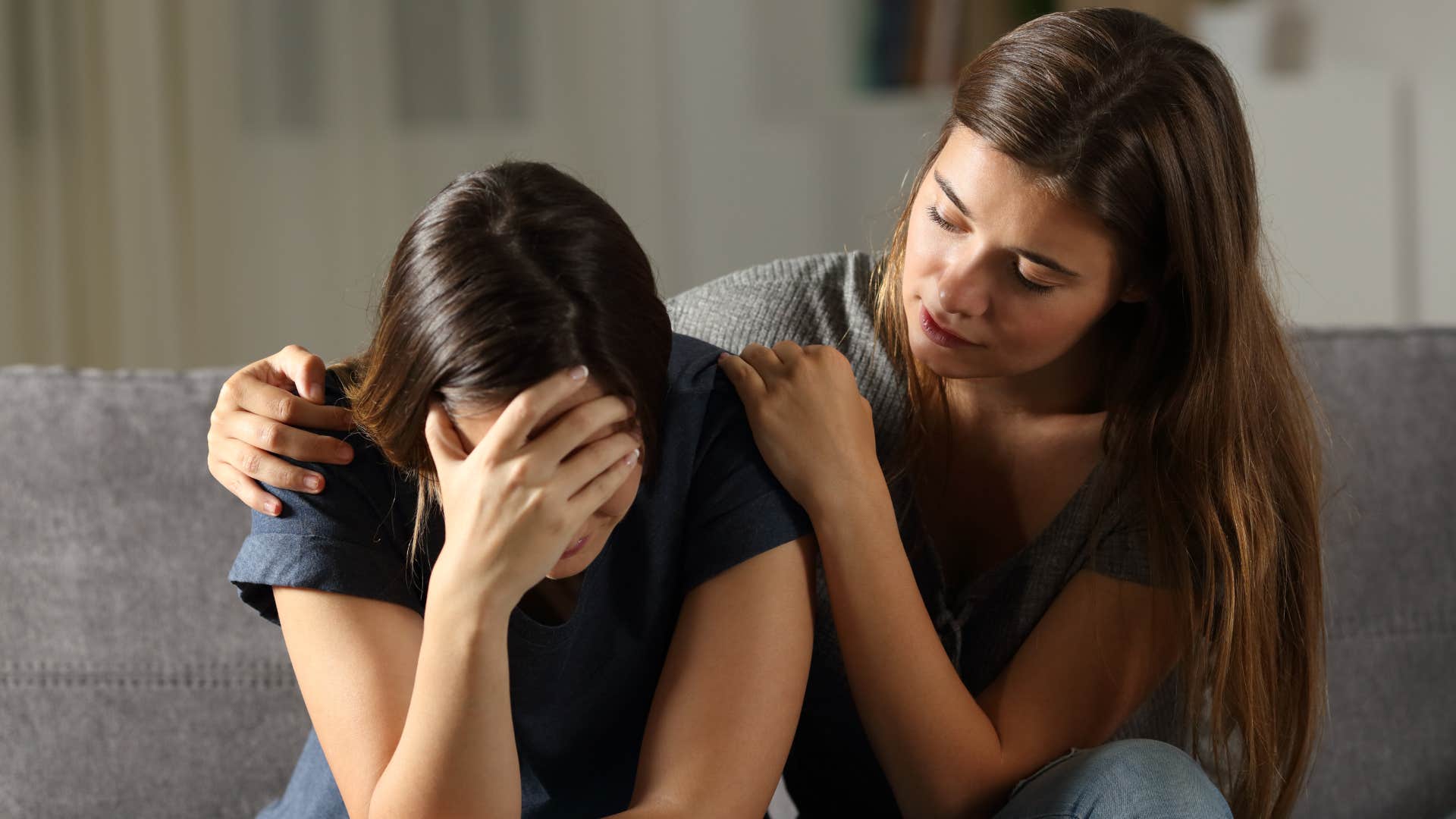 woman comforting unhappy friend who constantly complains