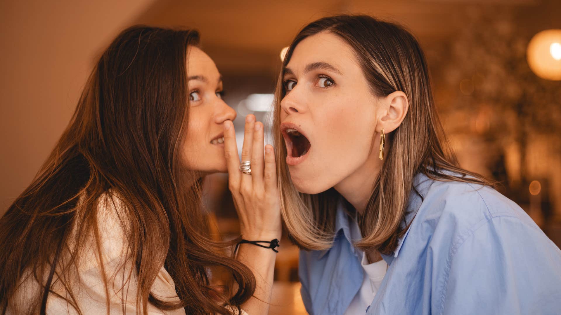 friends gossiping with one another as they seek drama