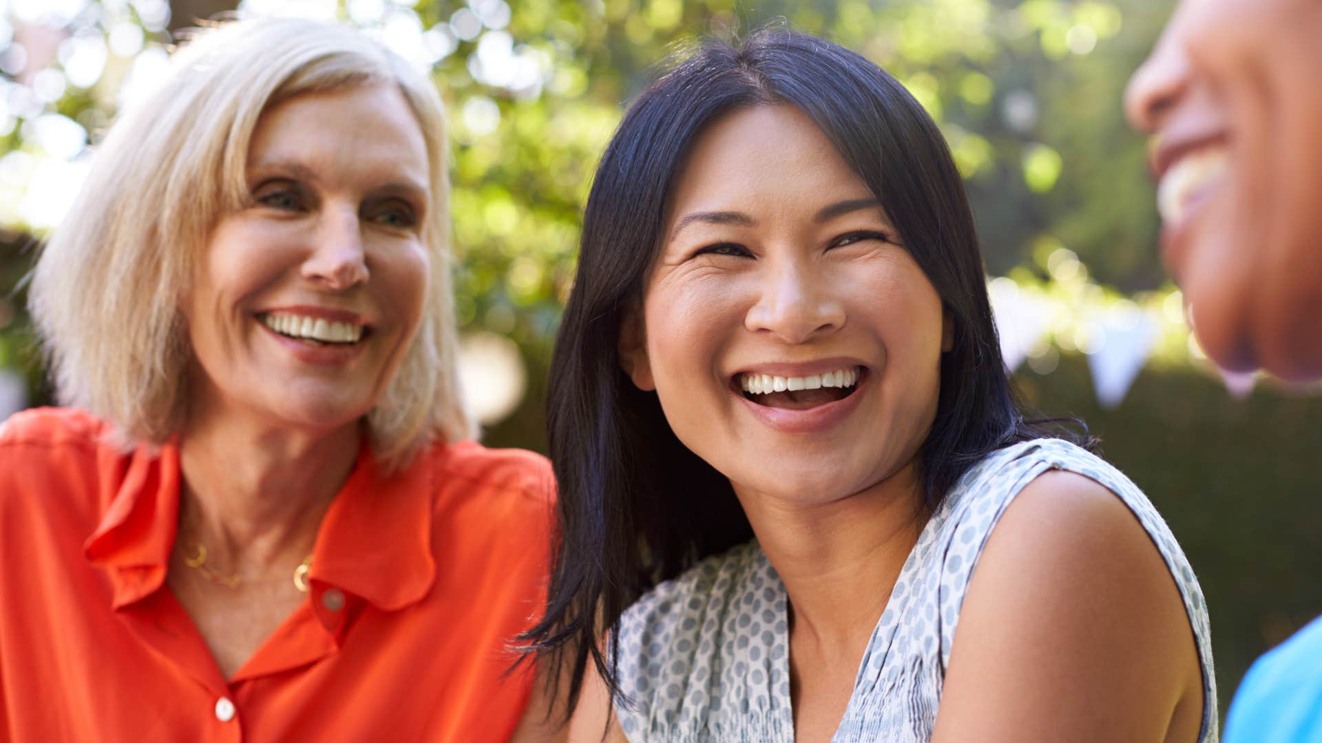 older women smiling enjoying their deep friendships