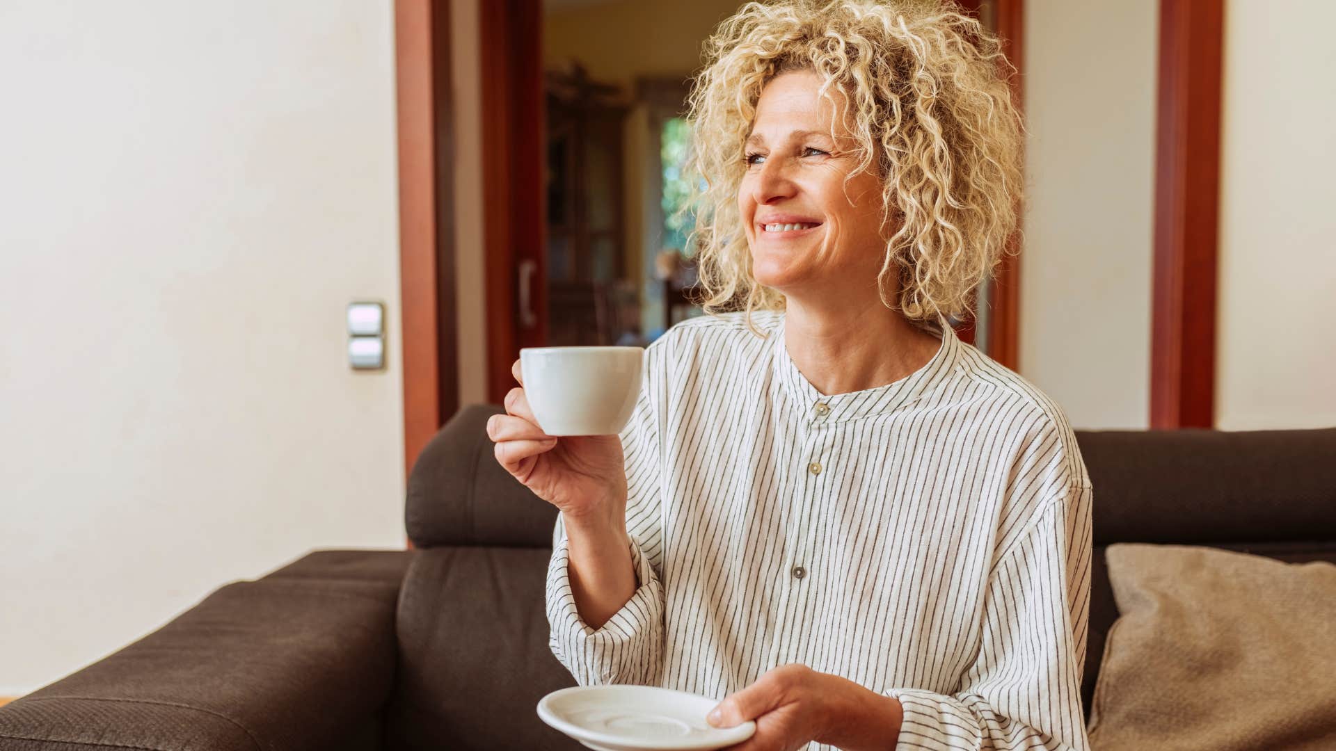 woman with the freedom to make her own choices smiling at home