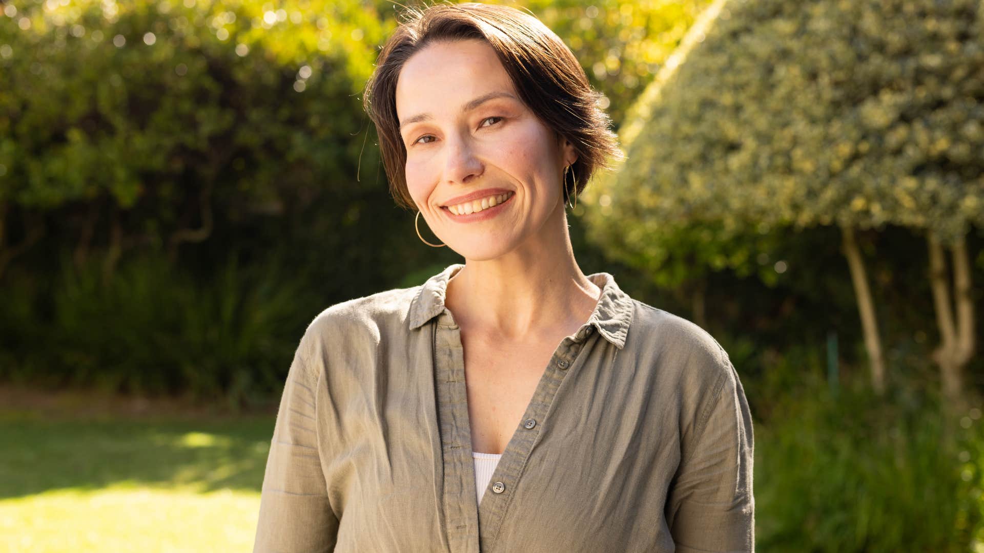 happy woman who doesn't have to deal with unbalanced emotional labor