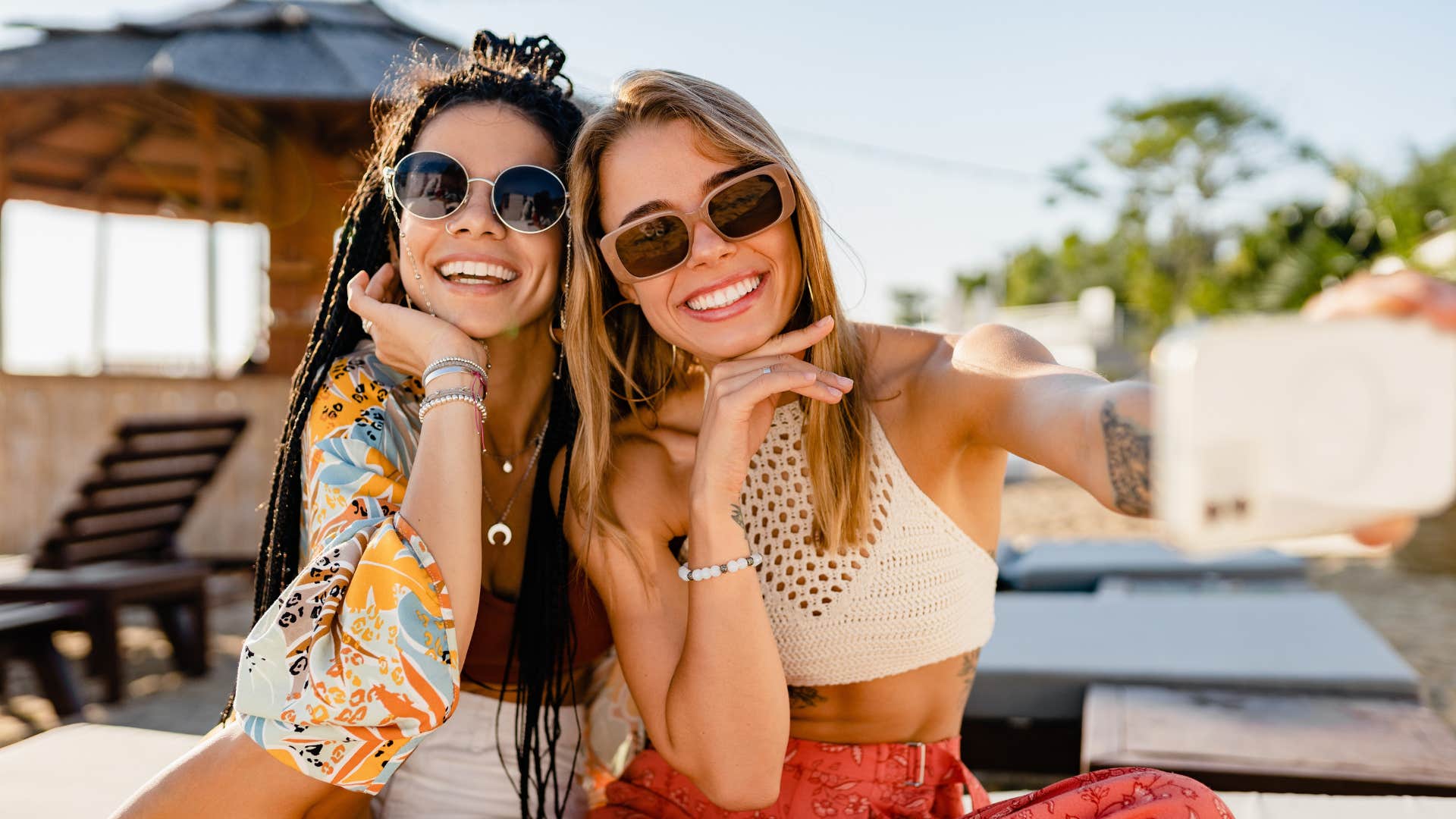 woman taking a selfie with friend