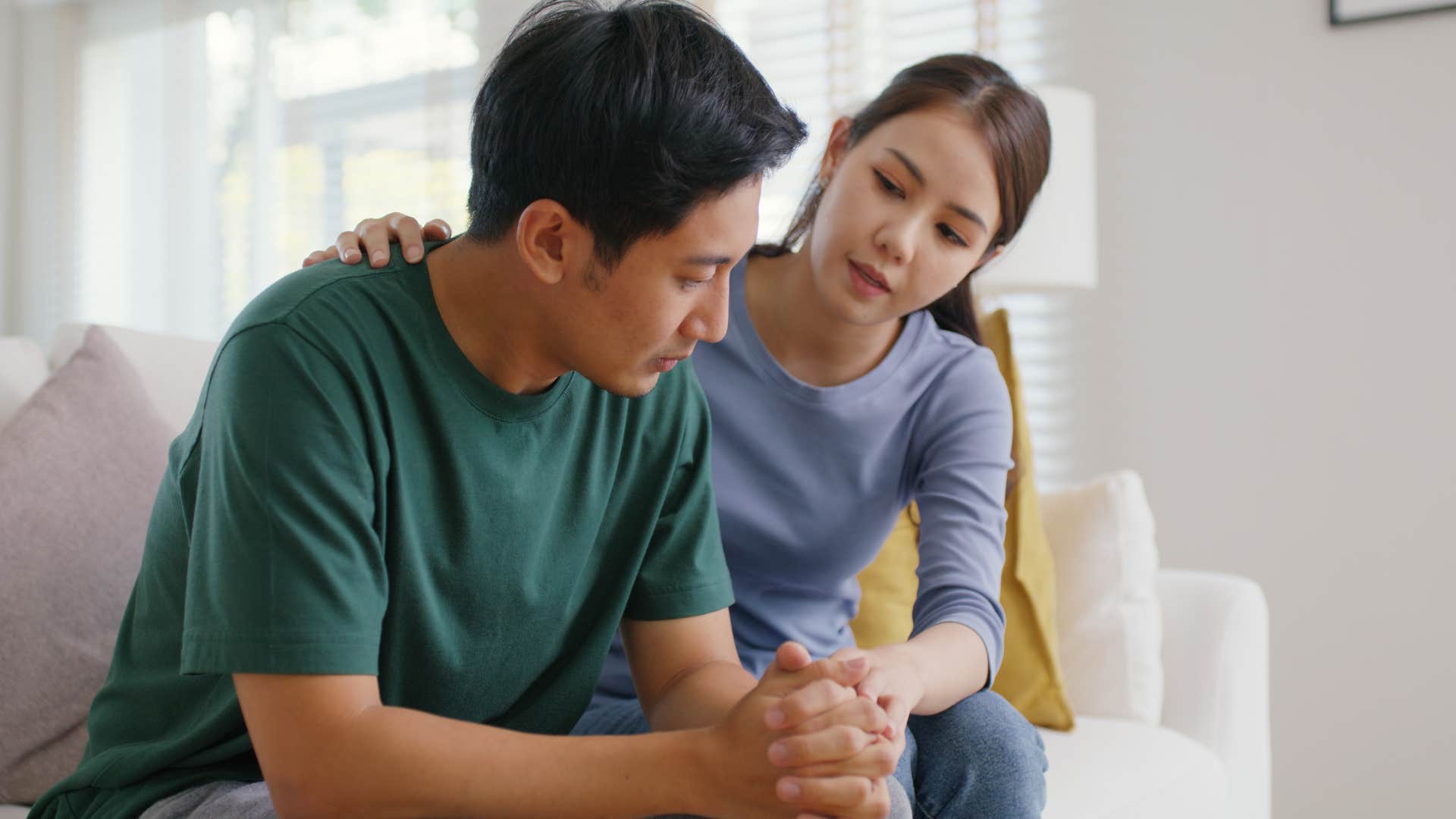 man expressing his emotions to his supportive wife