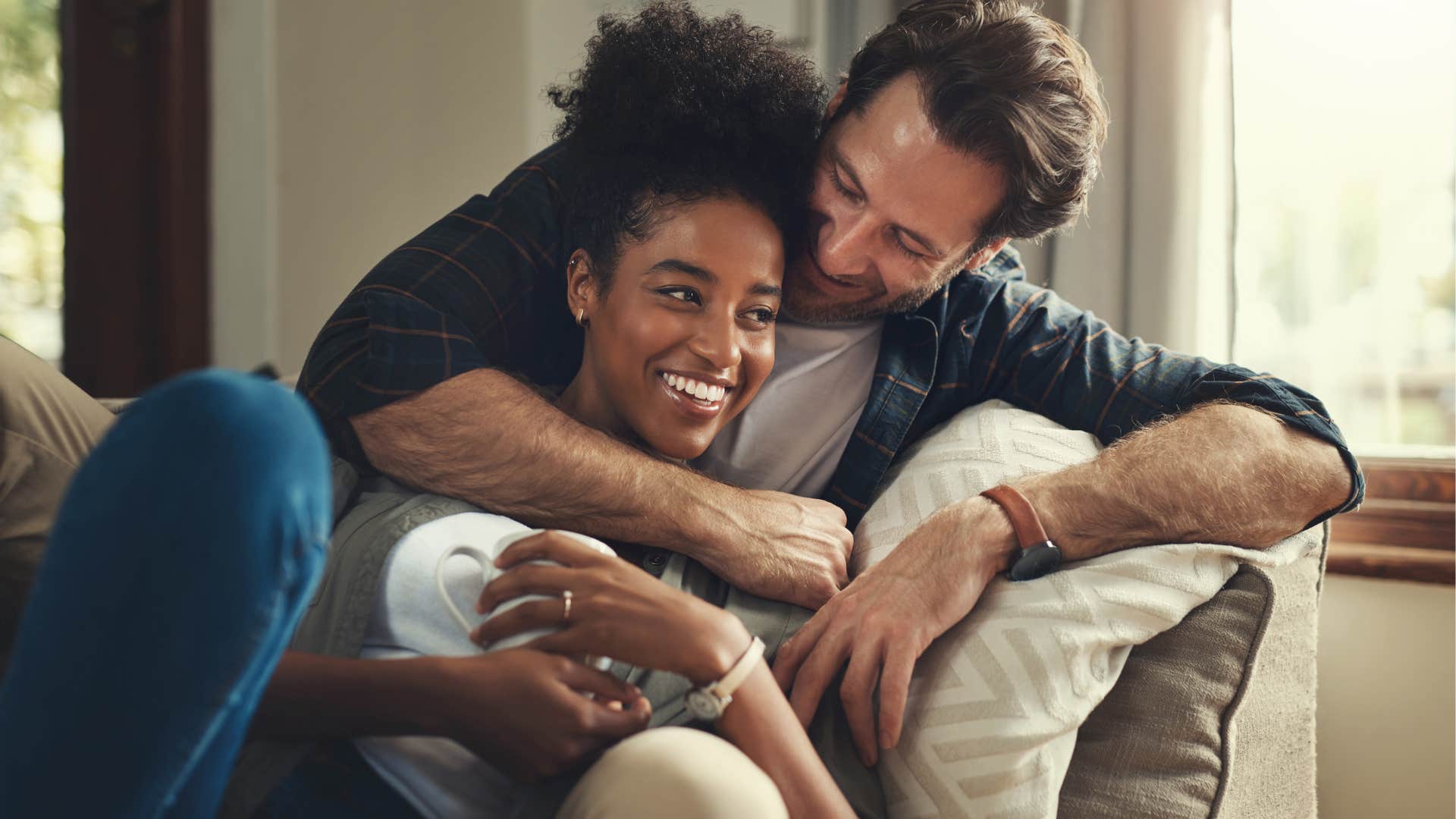 man remembering small things and hugging his wife