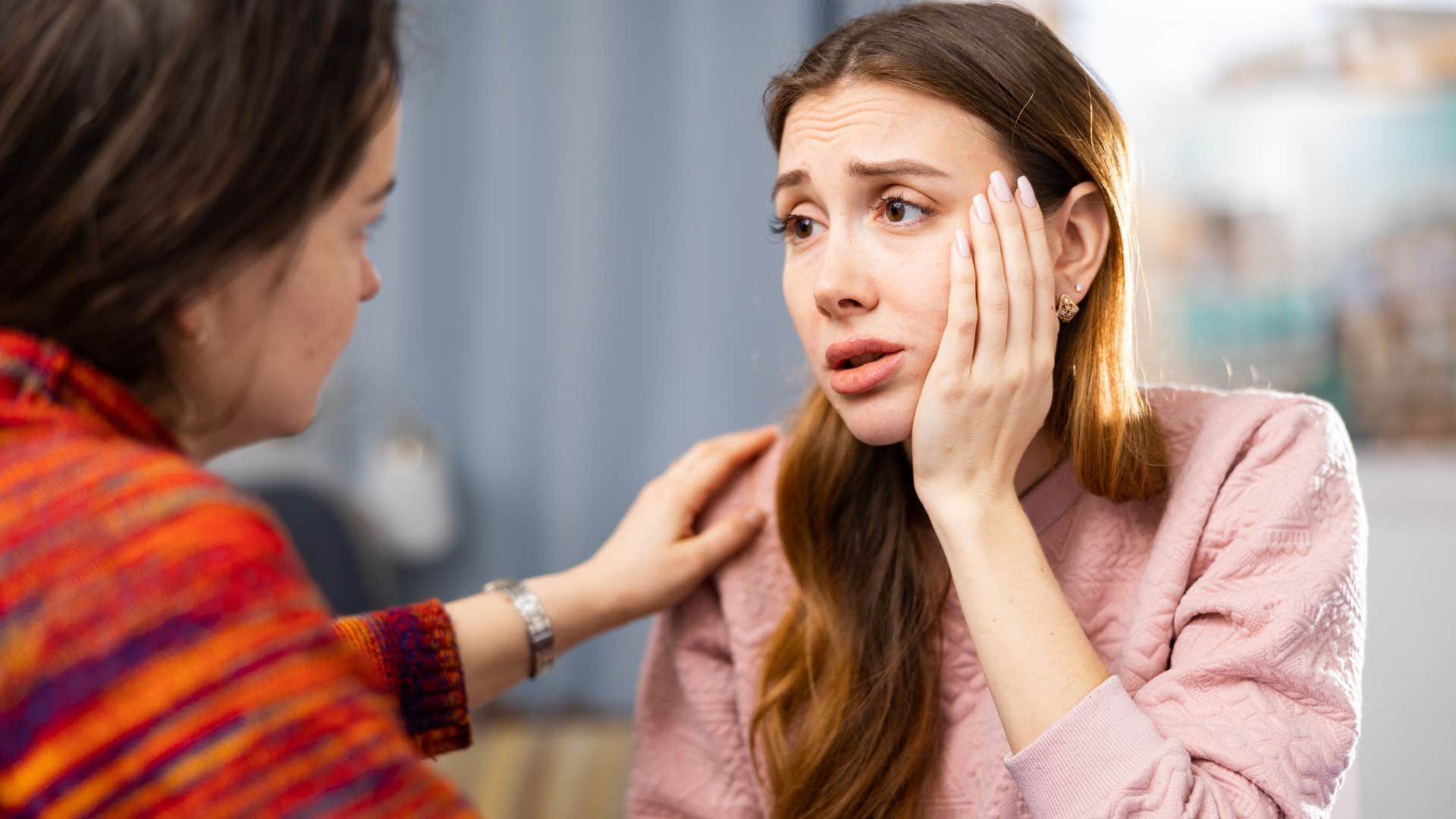 Woman who can ask for special treatment talking to her friend.