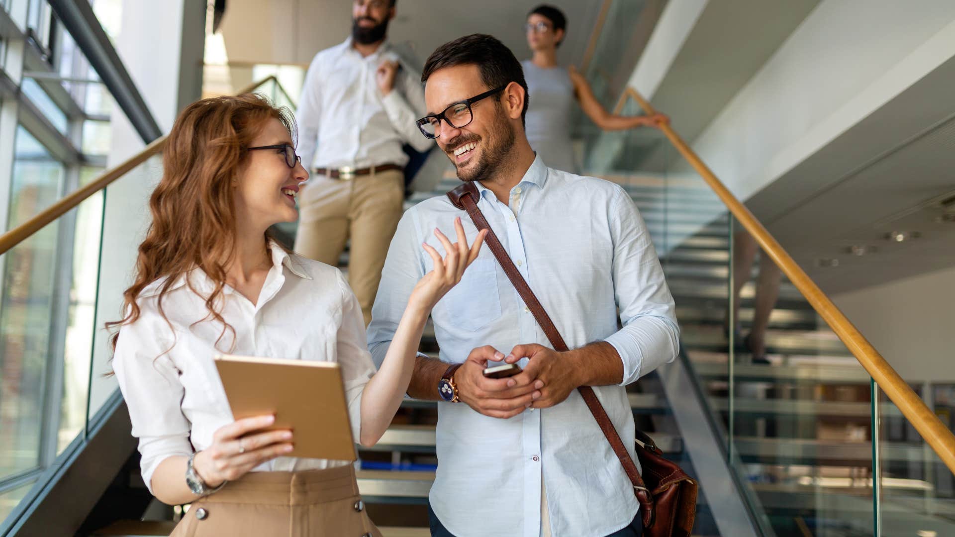 woman speaking to work colleague