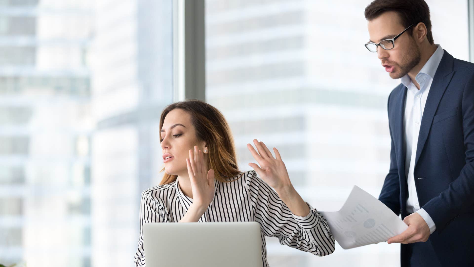 woman ignoring colleague's advice