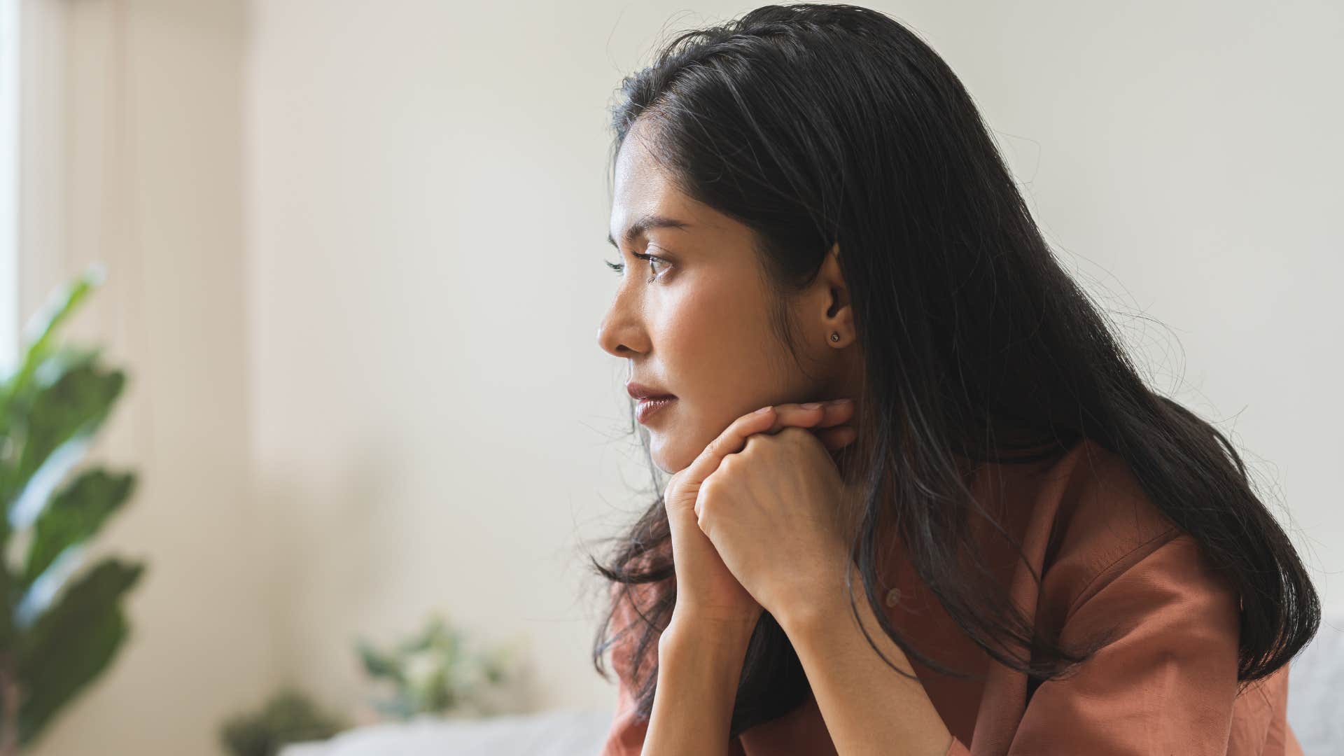 sad woman refusing to ask for help with mental health