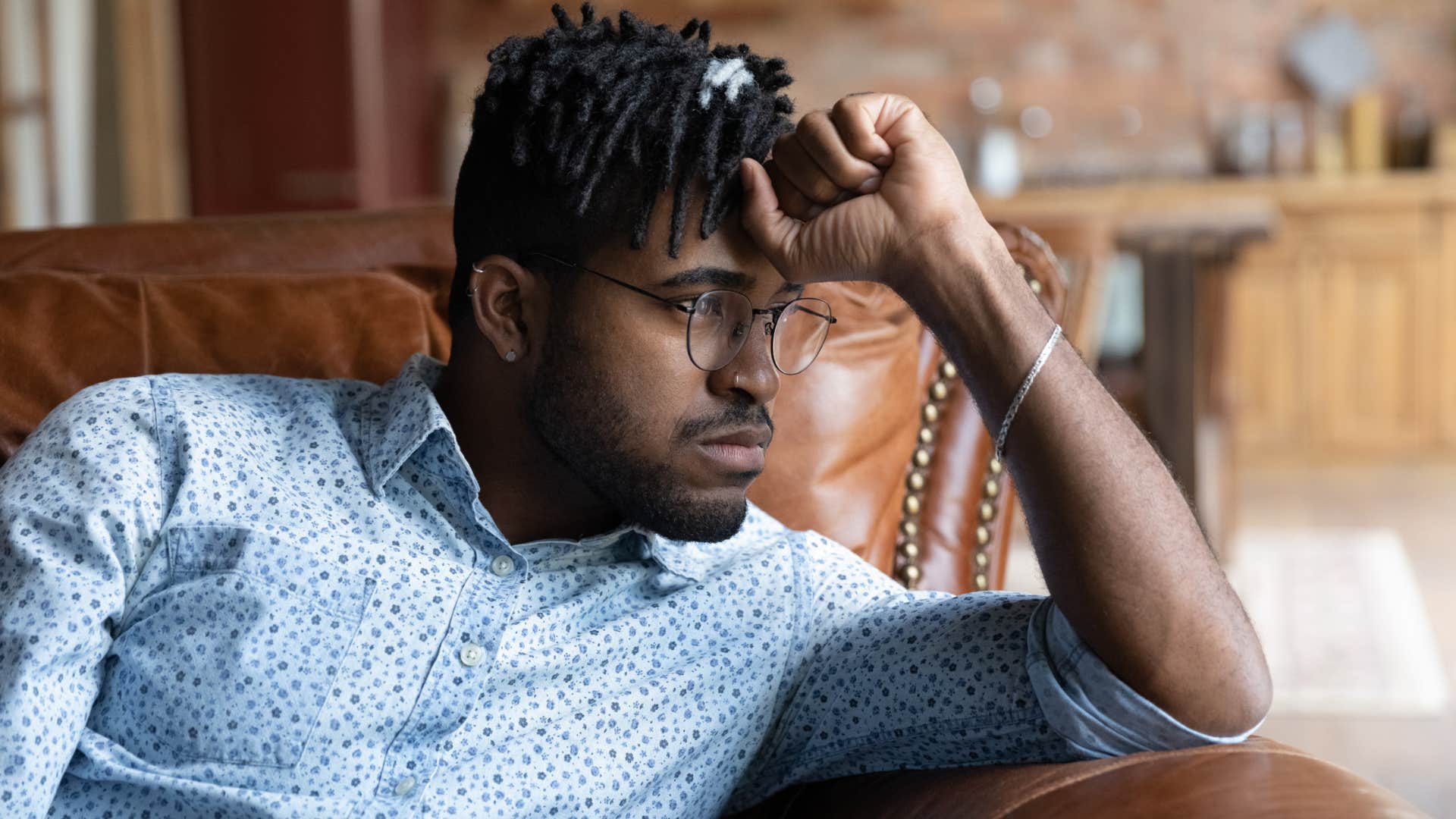sad man having regrets about his past