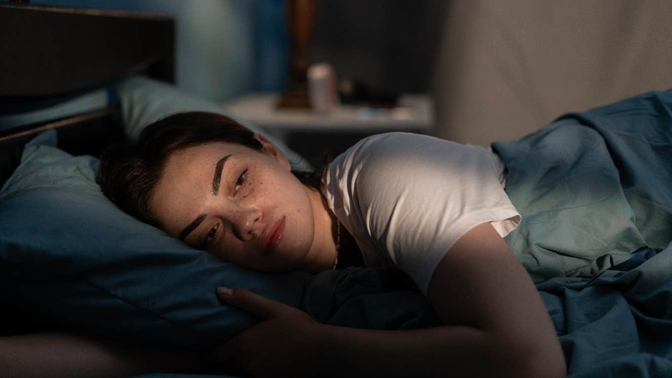 time waking up middle night meaning woman waking up middle night meaning