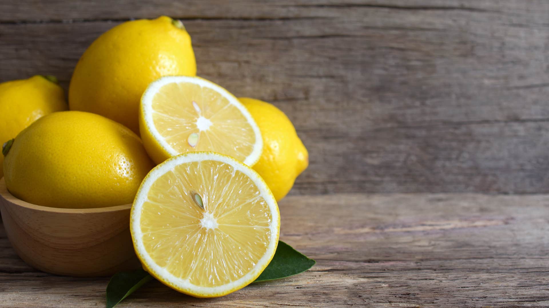 person wanting to feel better off by putting lemons in a bowl