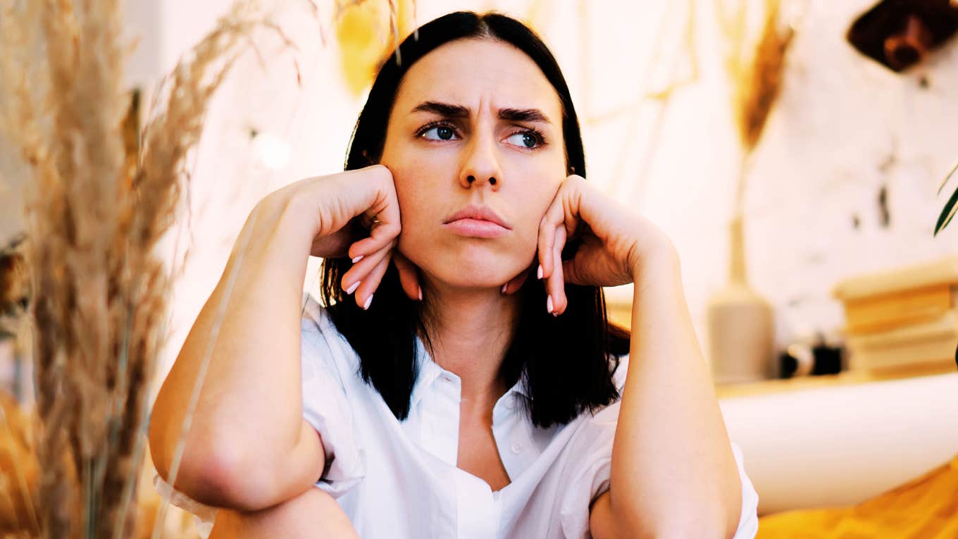 Warning Signs You're In Love With Someone Who Really Isn’t Right for You, According to Psychology Woman in love with someone who isn't right for her.