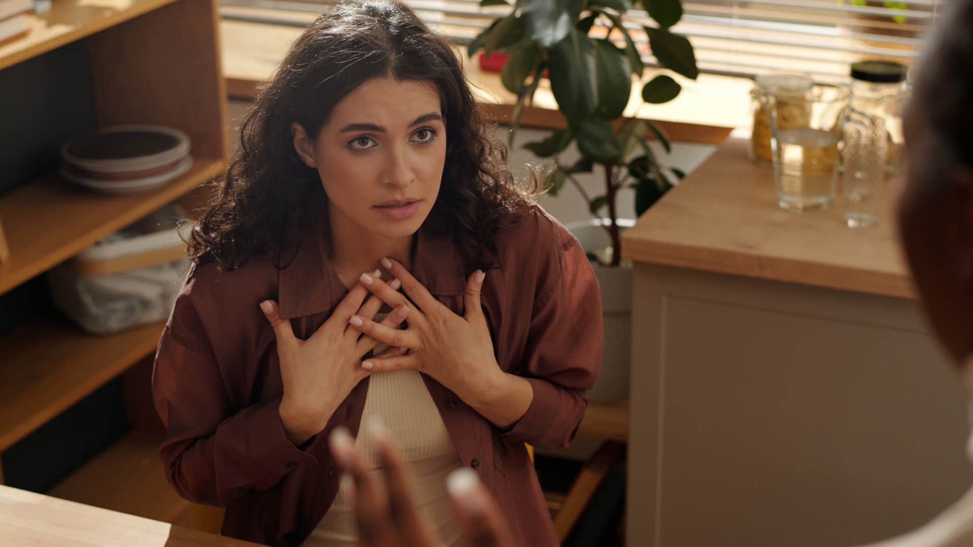 Woman who doesn't make excuses talking to an upset friend.