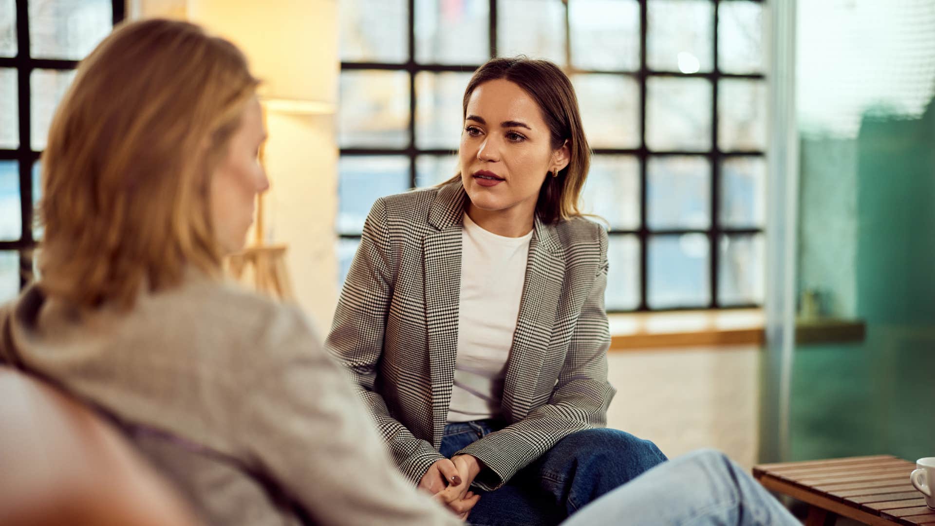 woman talking with know-it-all keeping her composure