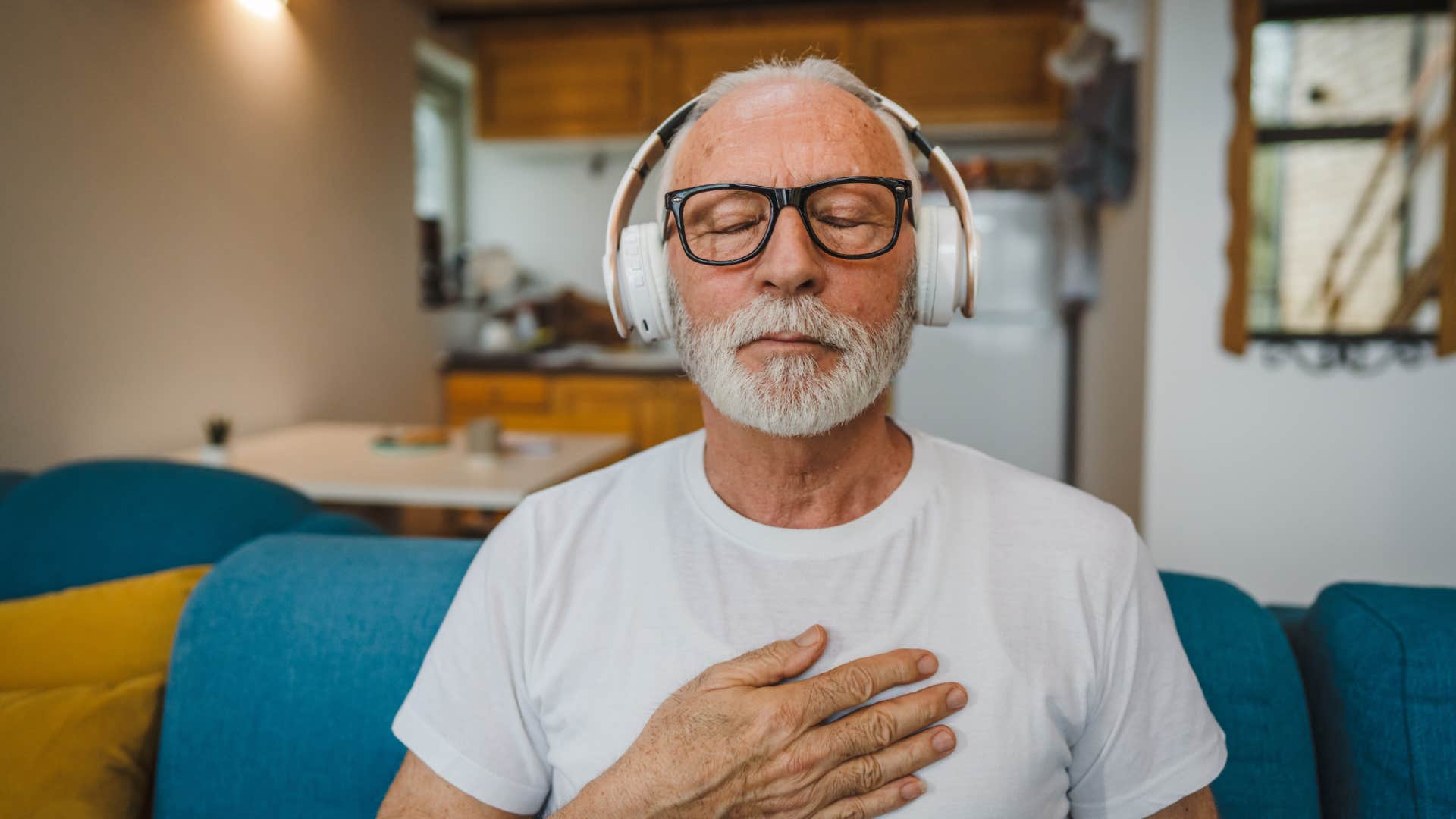 man focusing on his mental health meditating