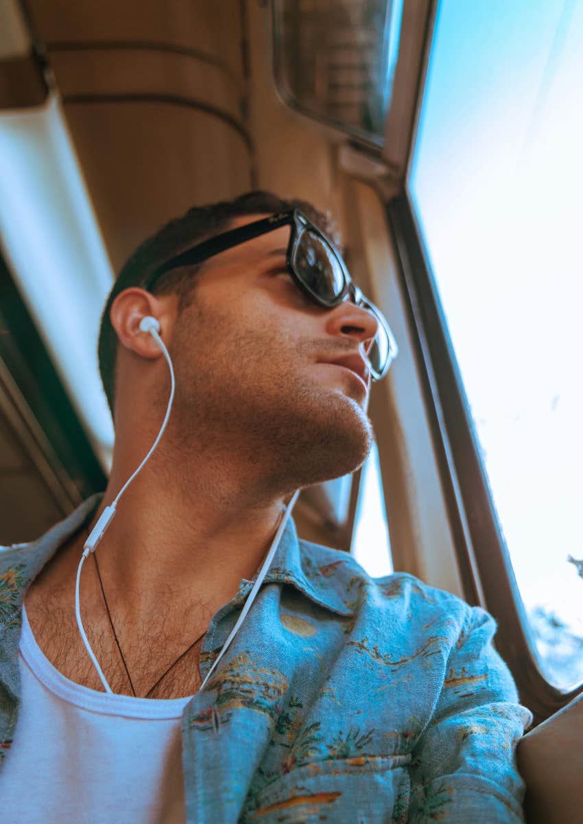 man listening to music in the background