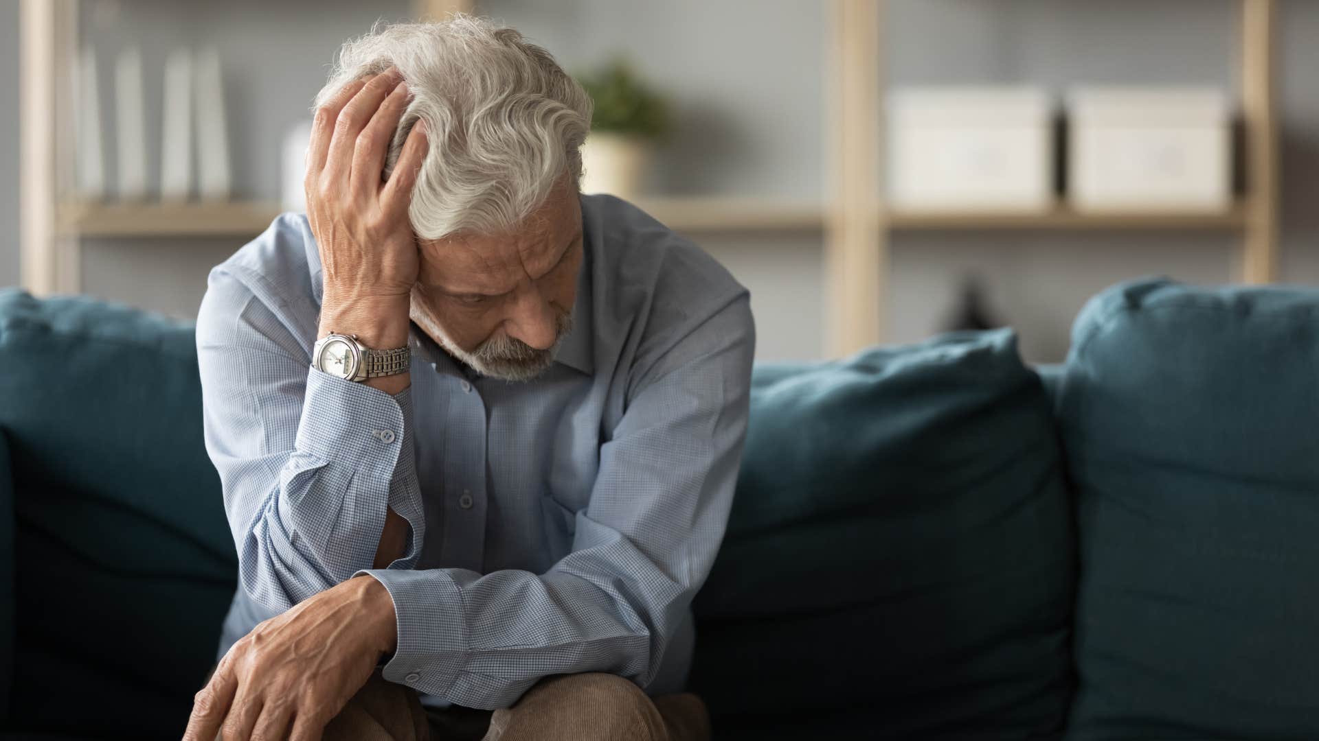 older man in blue shirt upset as wife made jokes at his expense