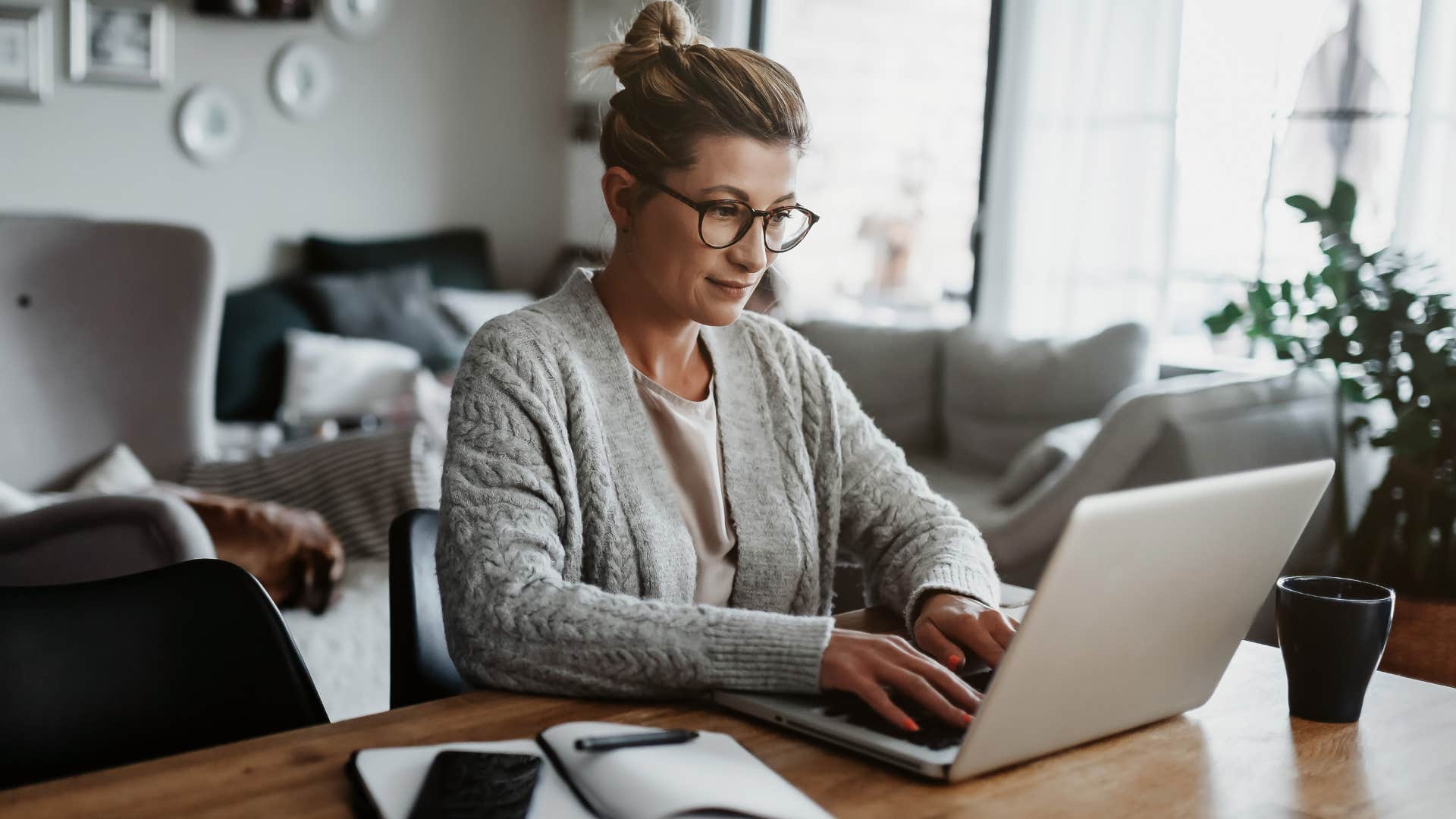 Woman who stays busy working at home.