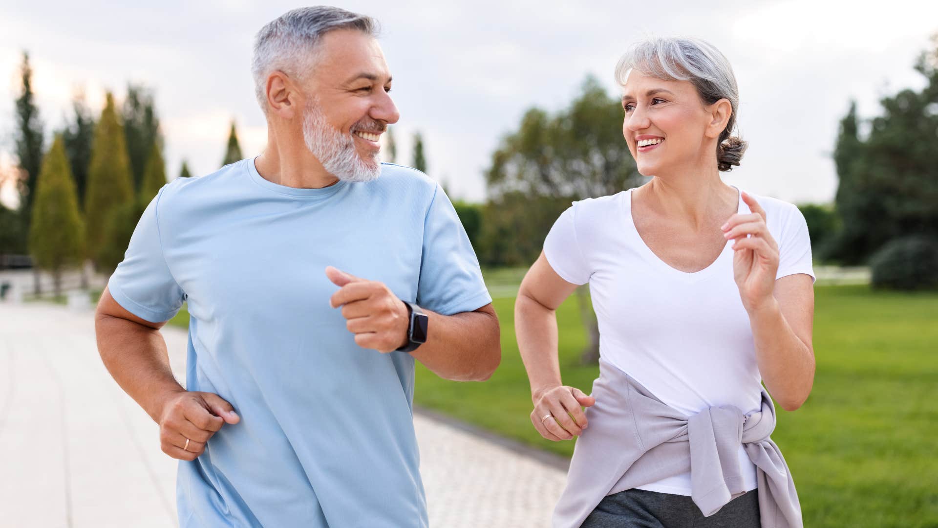Man saying "I love our life" while running with his wife.