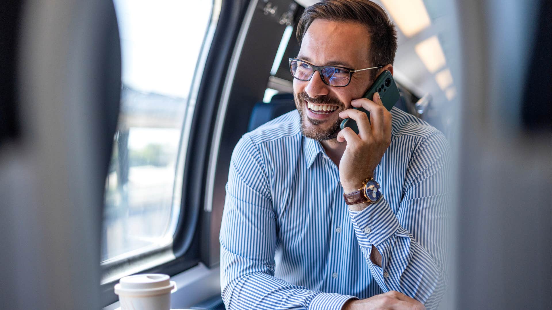 Man saying "I miss you" while on the phone with his wife.