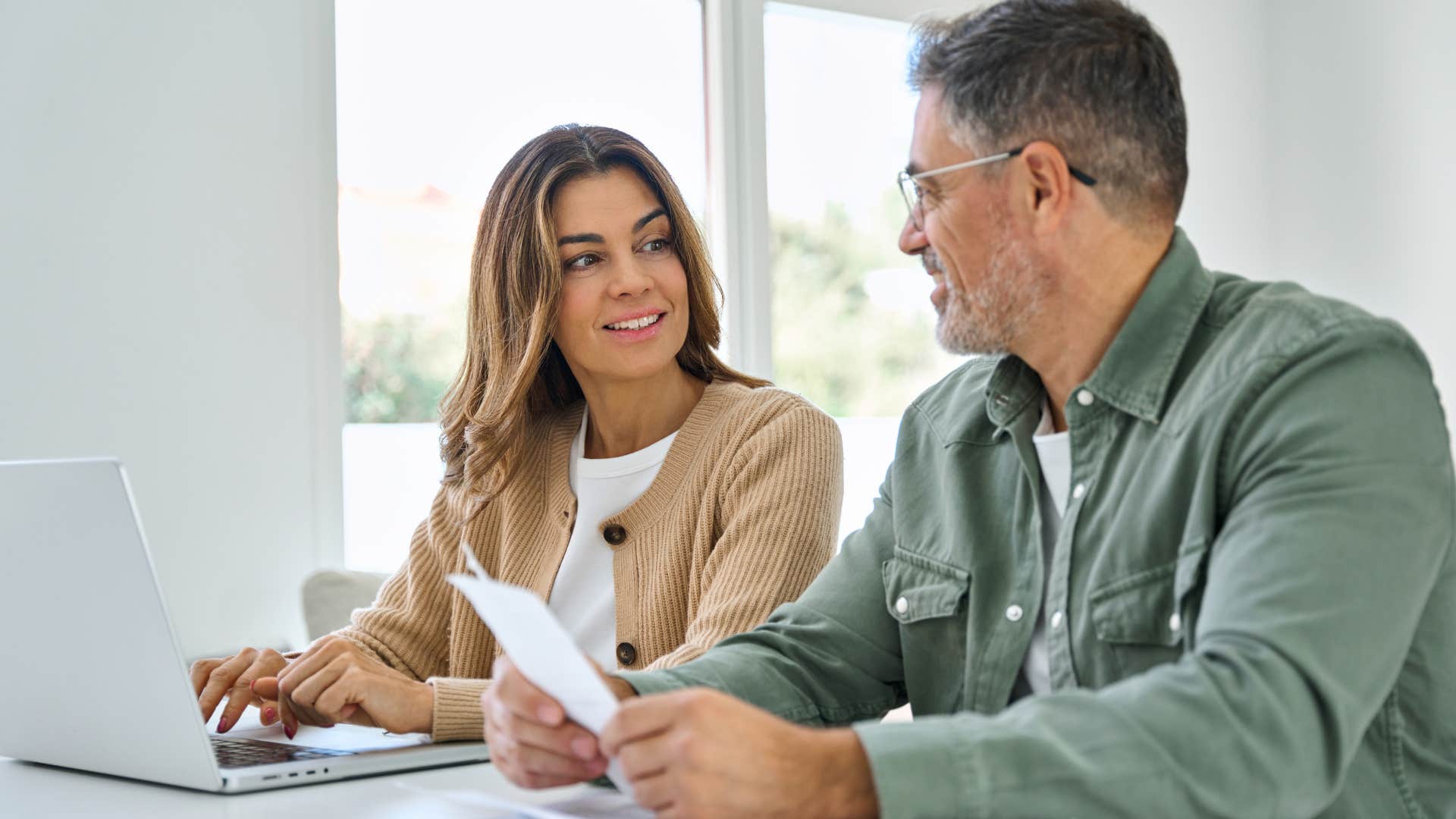 Man saying "I respect your decision" to his wife.