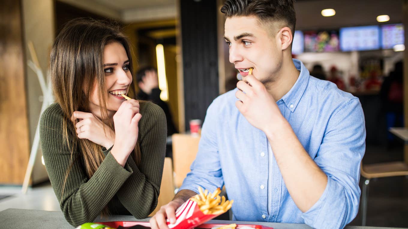 Woman Feels 'Insulted' After Date Sends Her A Venmo Request For The Fries They Shared couple sharing fries on a date