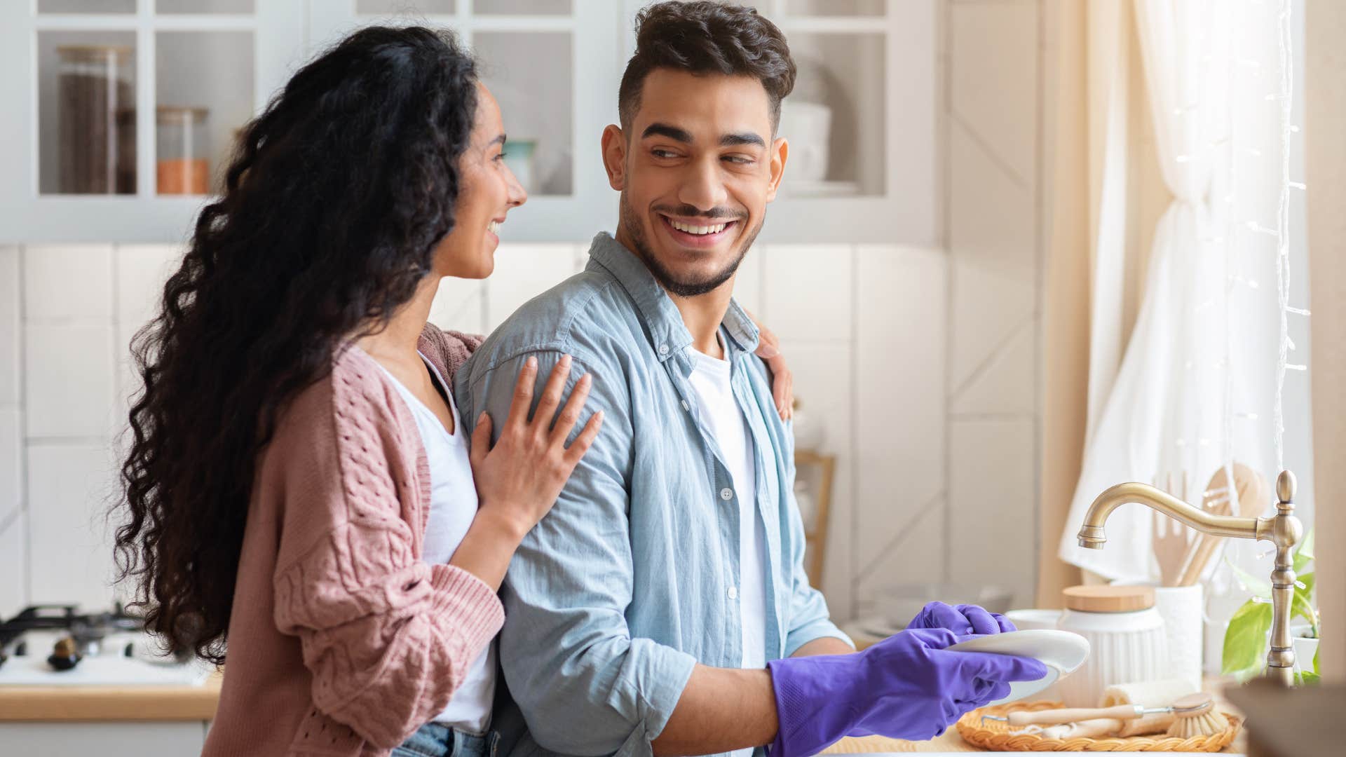 a husband pitches in to do the dishes without being asked