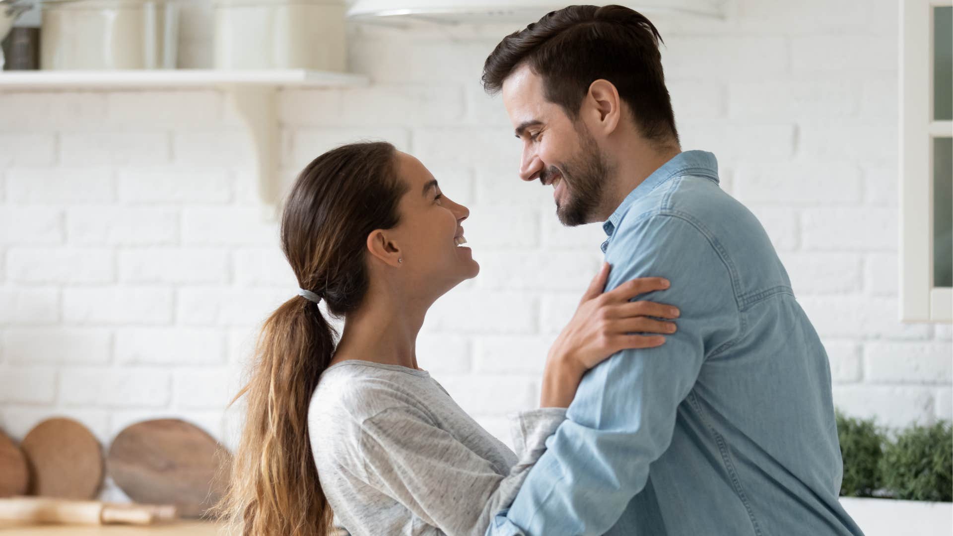 a husband is glad his wife is back from her trip overseas