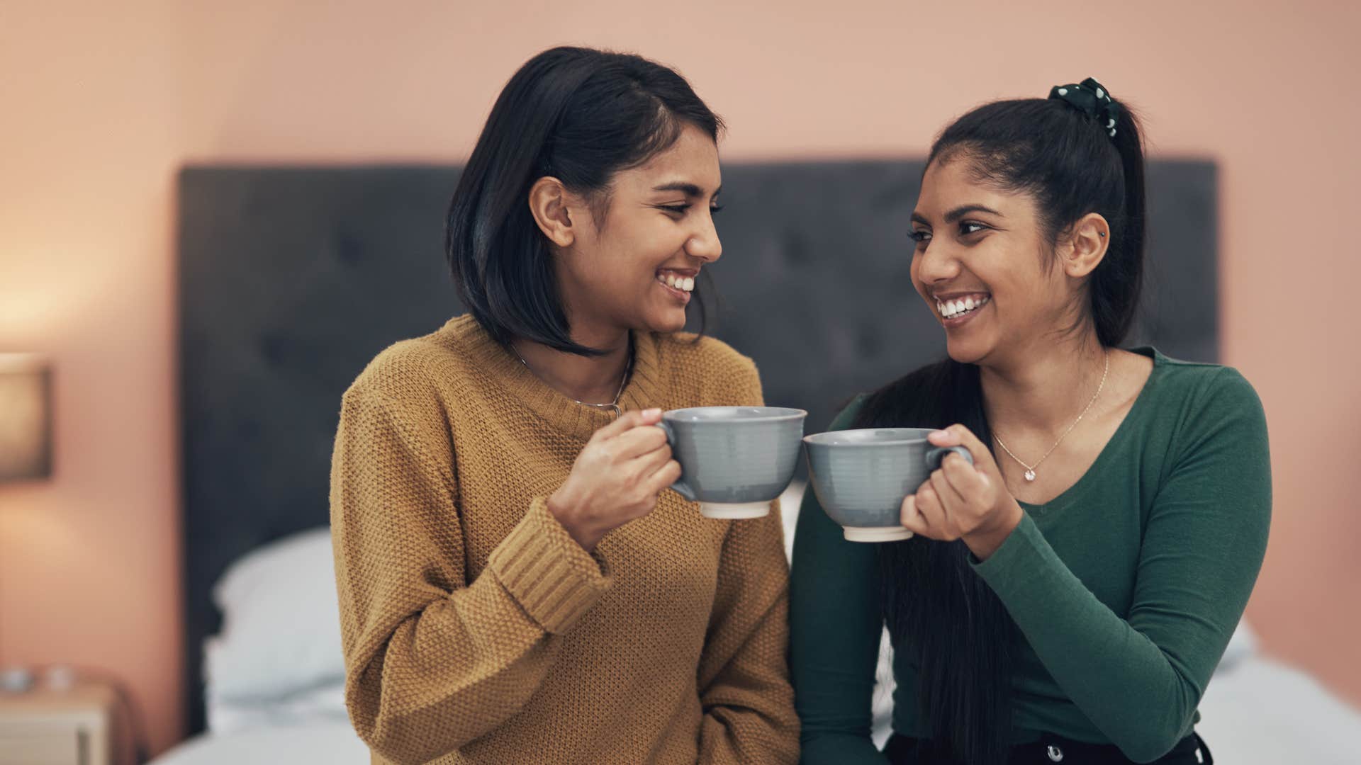 woman who radiates calm without using fancy wellness tools inviting friend to coffee