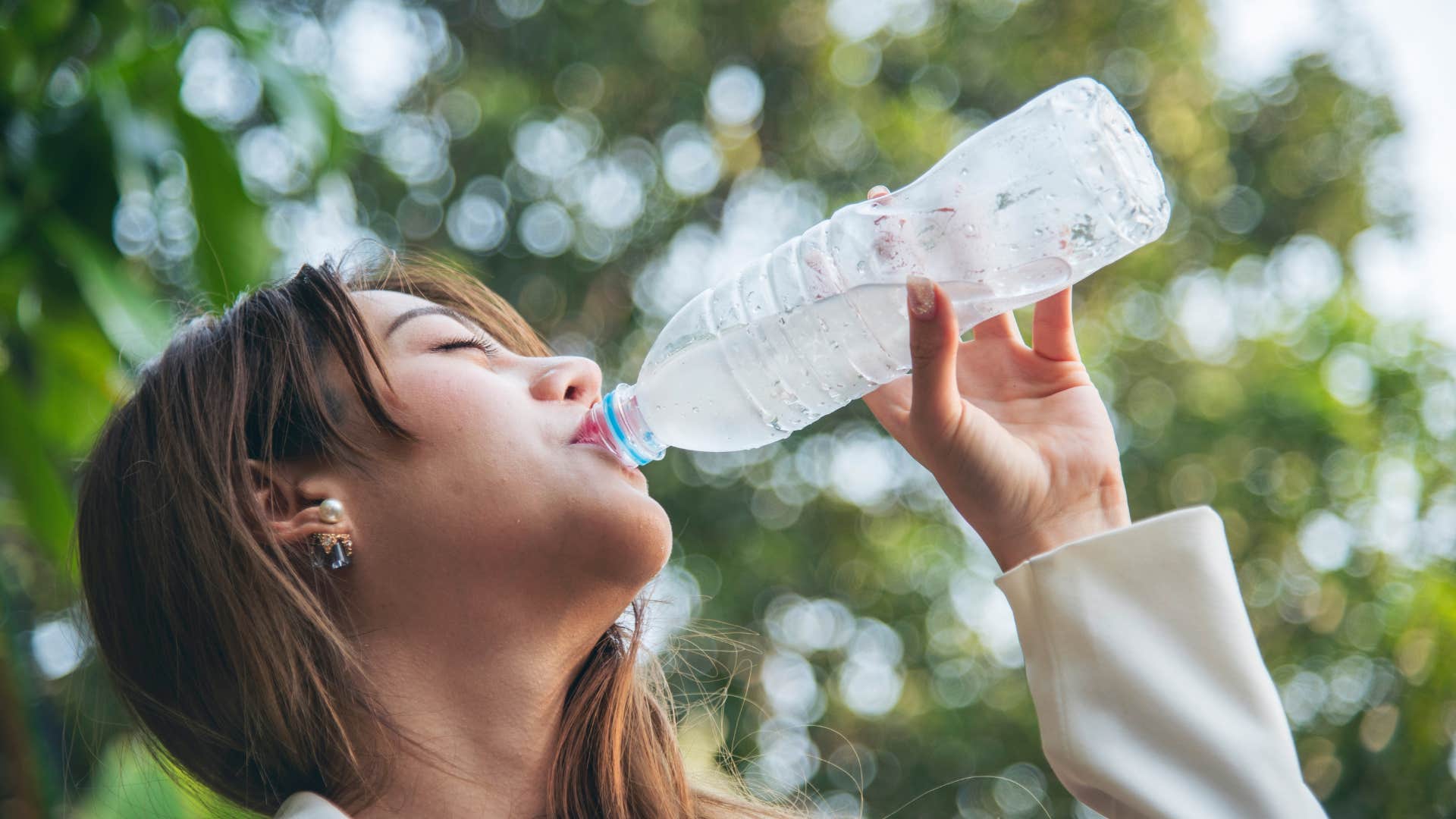 a woman tries not to neglect her need for hydration