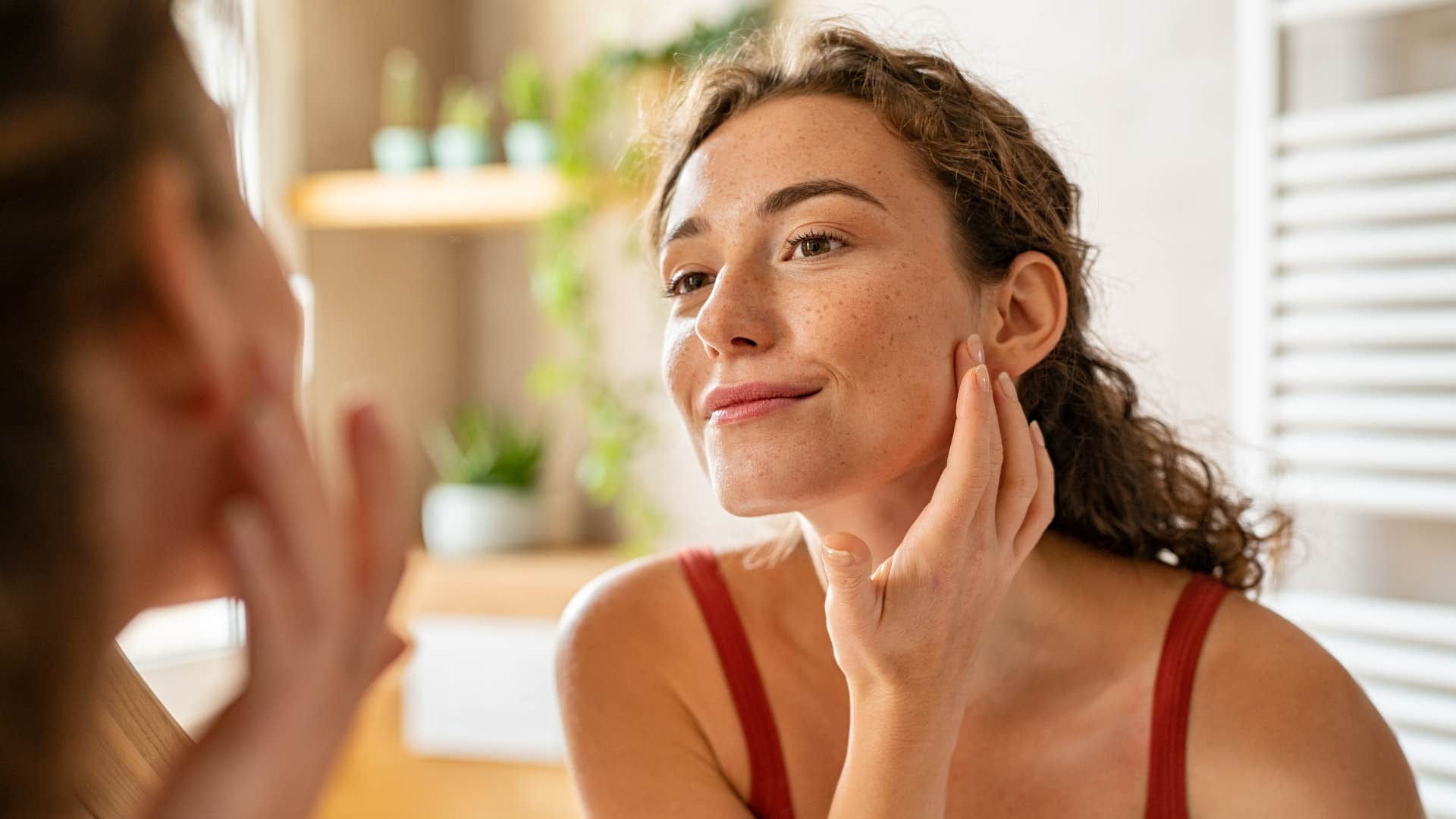 a woman takes care of her skin and is aging beautifully
