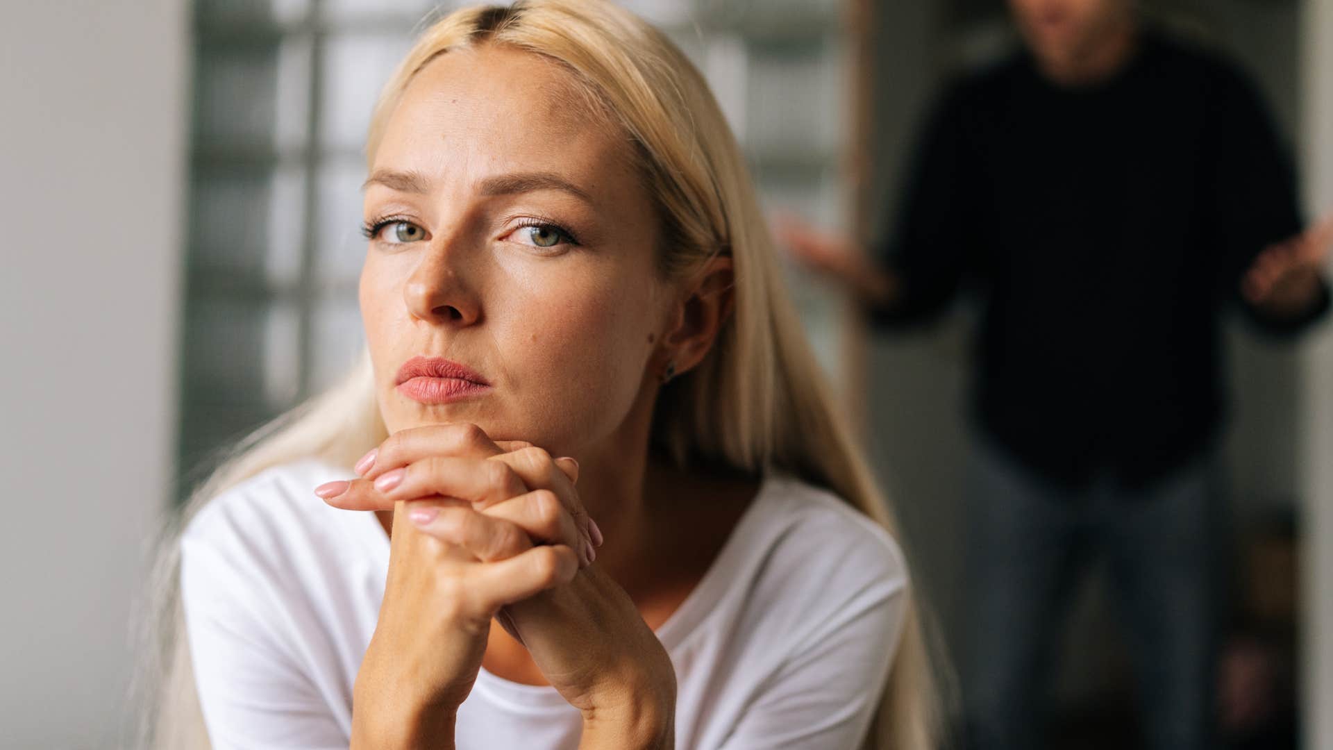 Woman who can avoid intimacy looking at the camera.