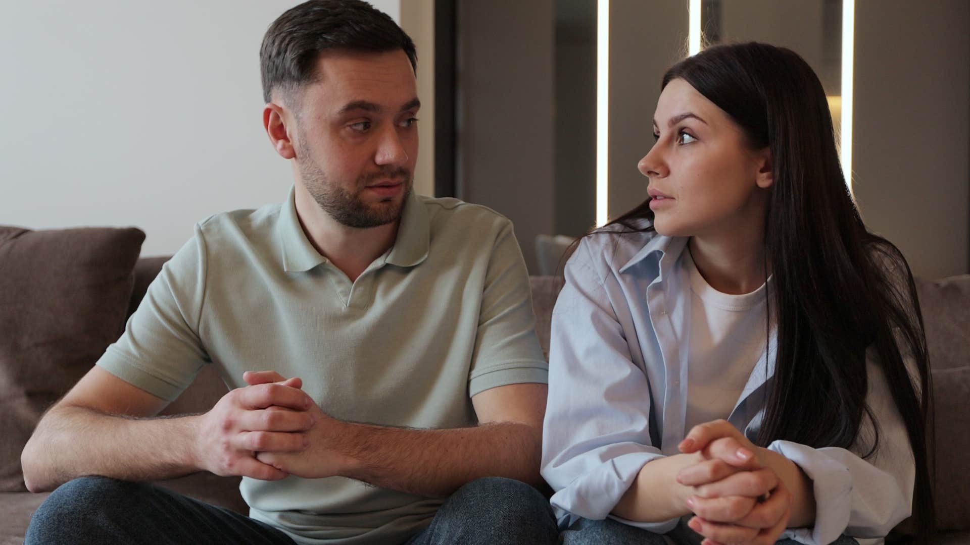 woman saying I'm fine to her upset husband