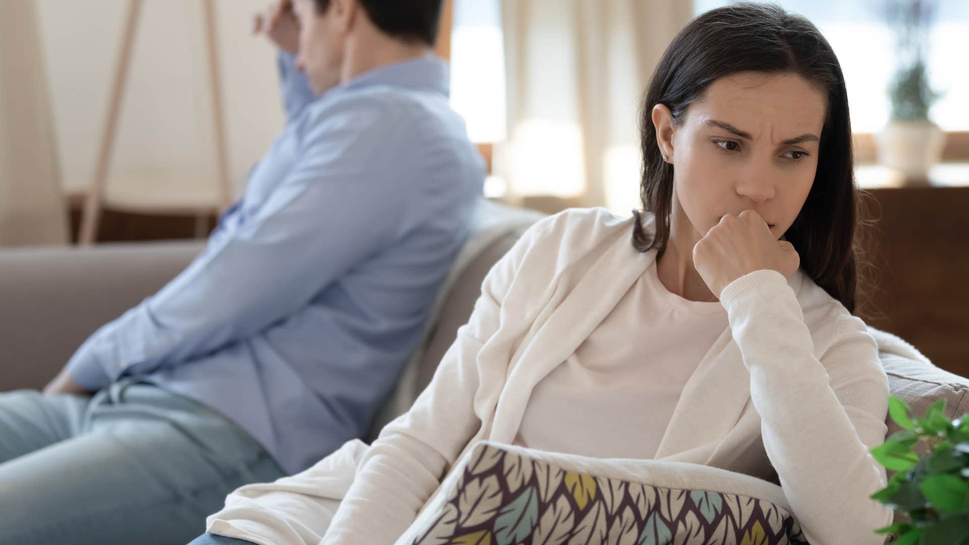 woman who keeps secrets turned away from her husband