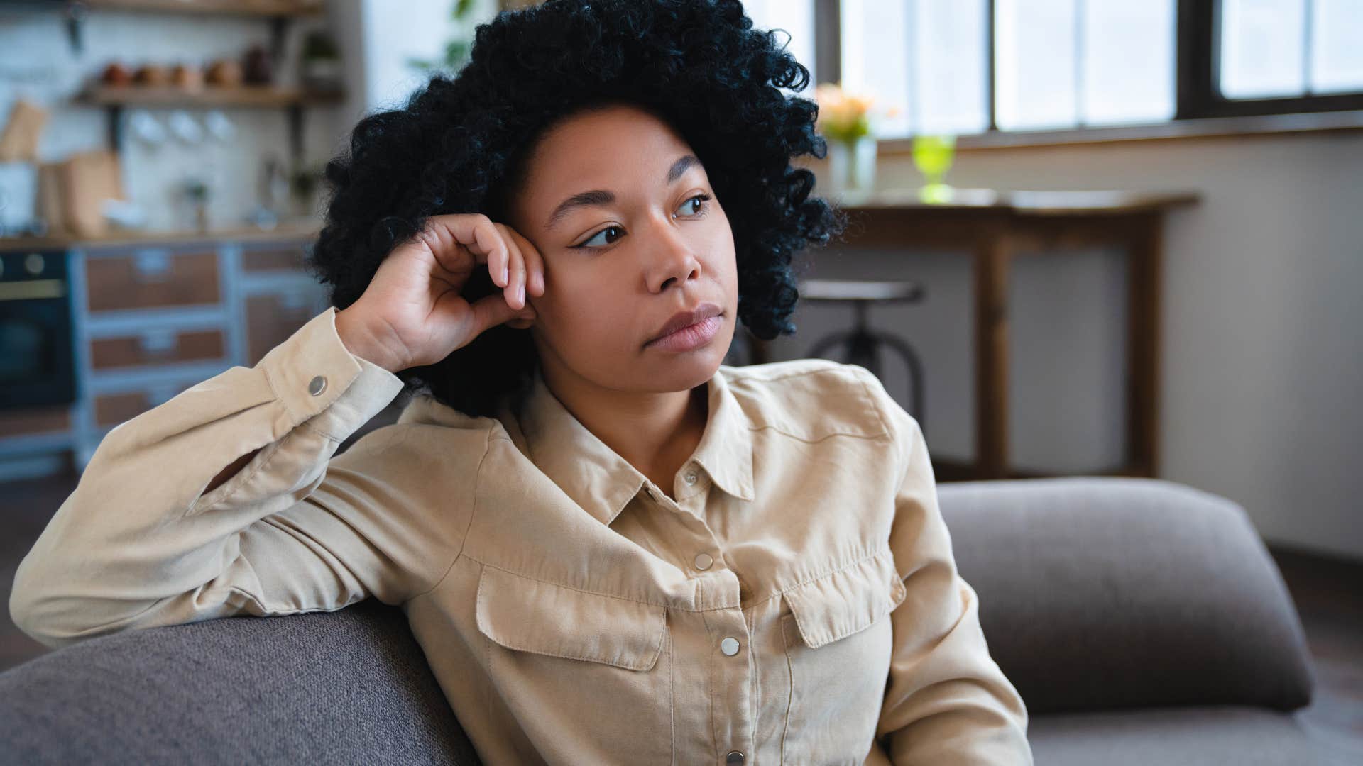 woman sitting with her thoughts