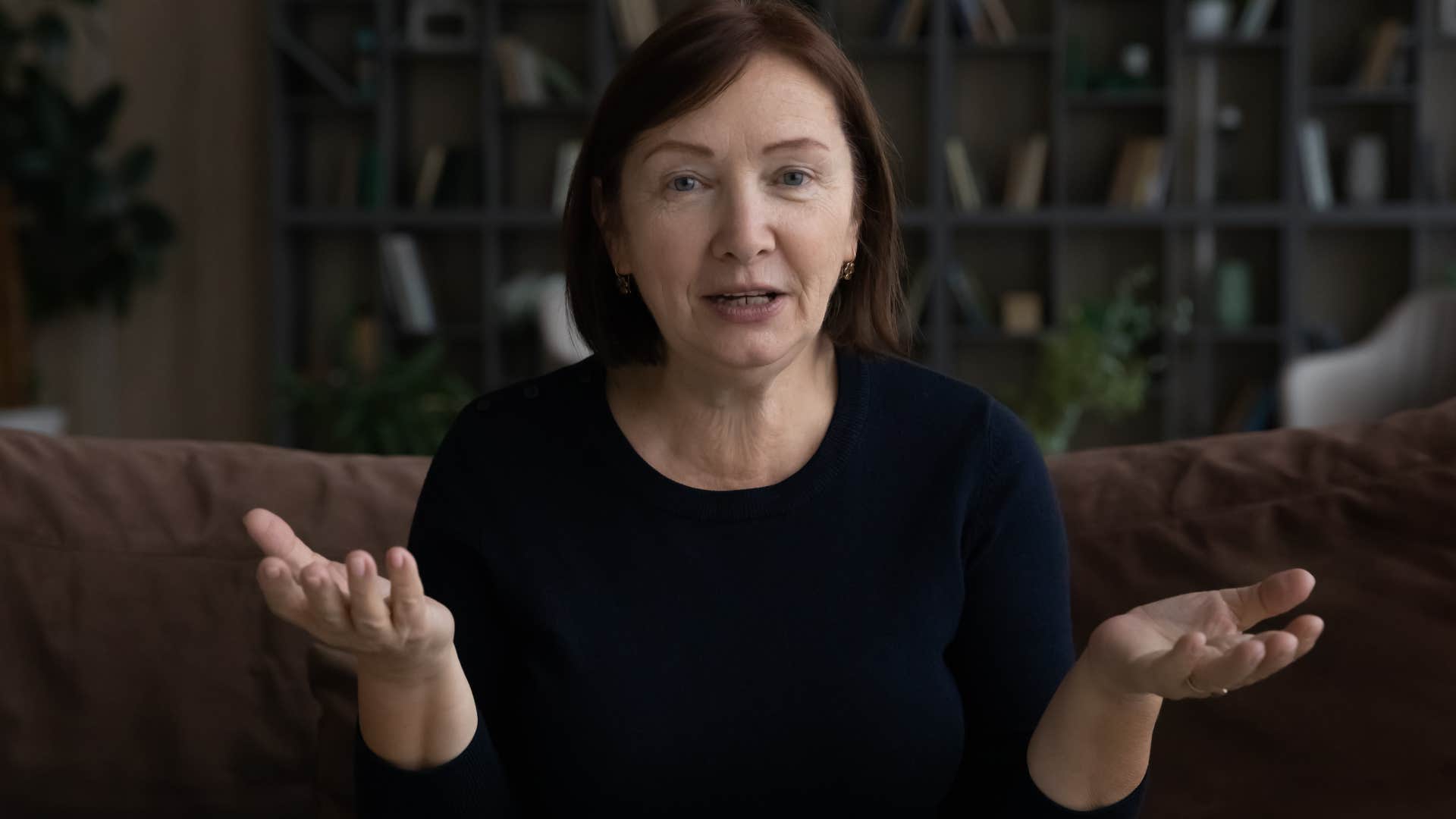 Woman saying "this happens to everyone" to someone behind the camera.