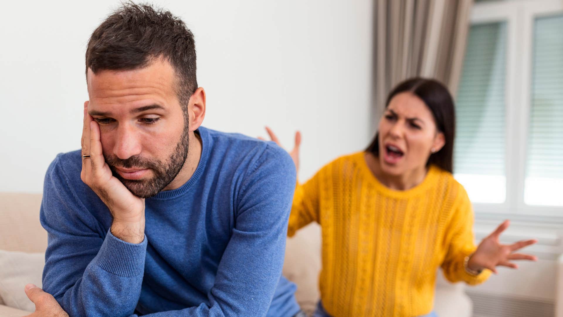 a woman discourages her partner from achieving his dreams