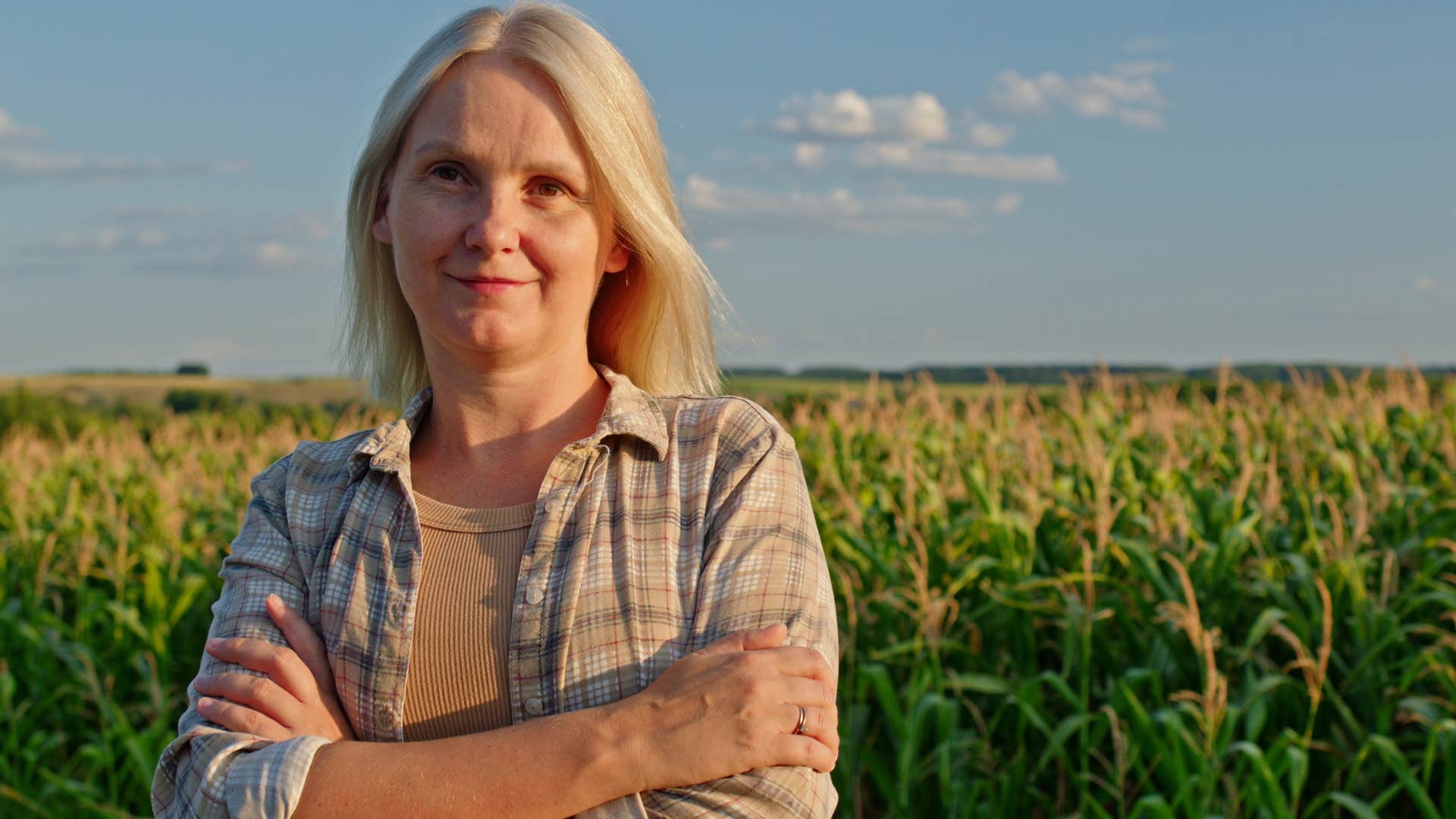woman who trusts her gut smiling outside