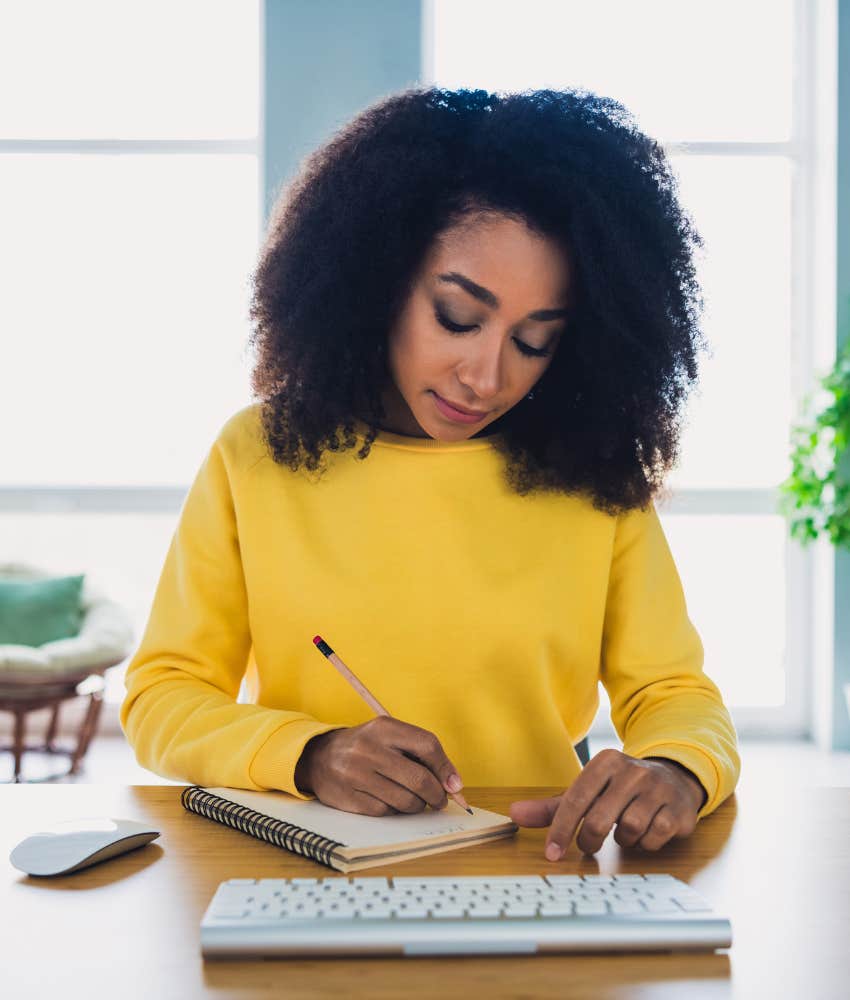 Happy woman makes list