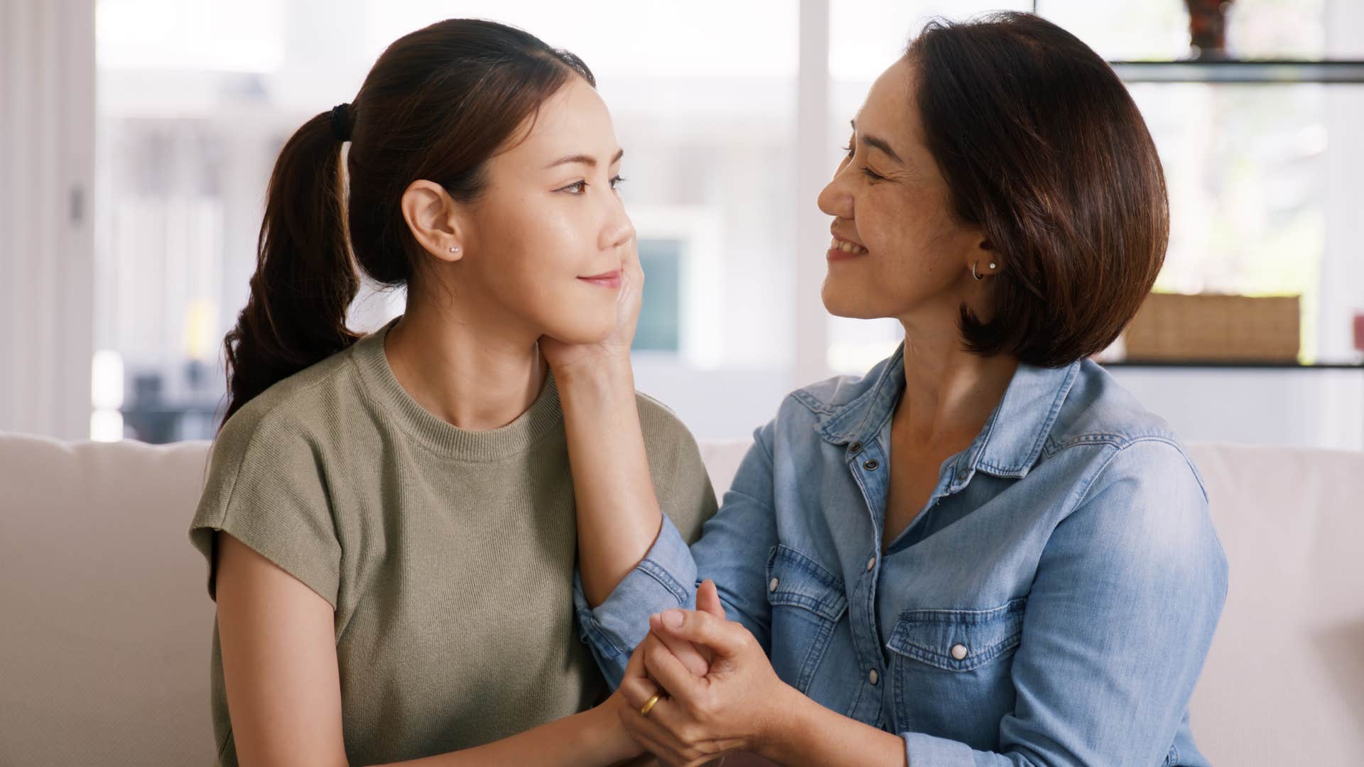 Woman who apologized often comforting her adult daughter.