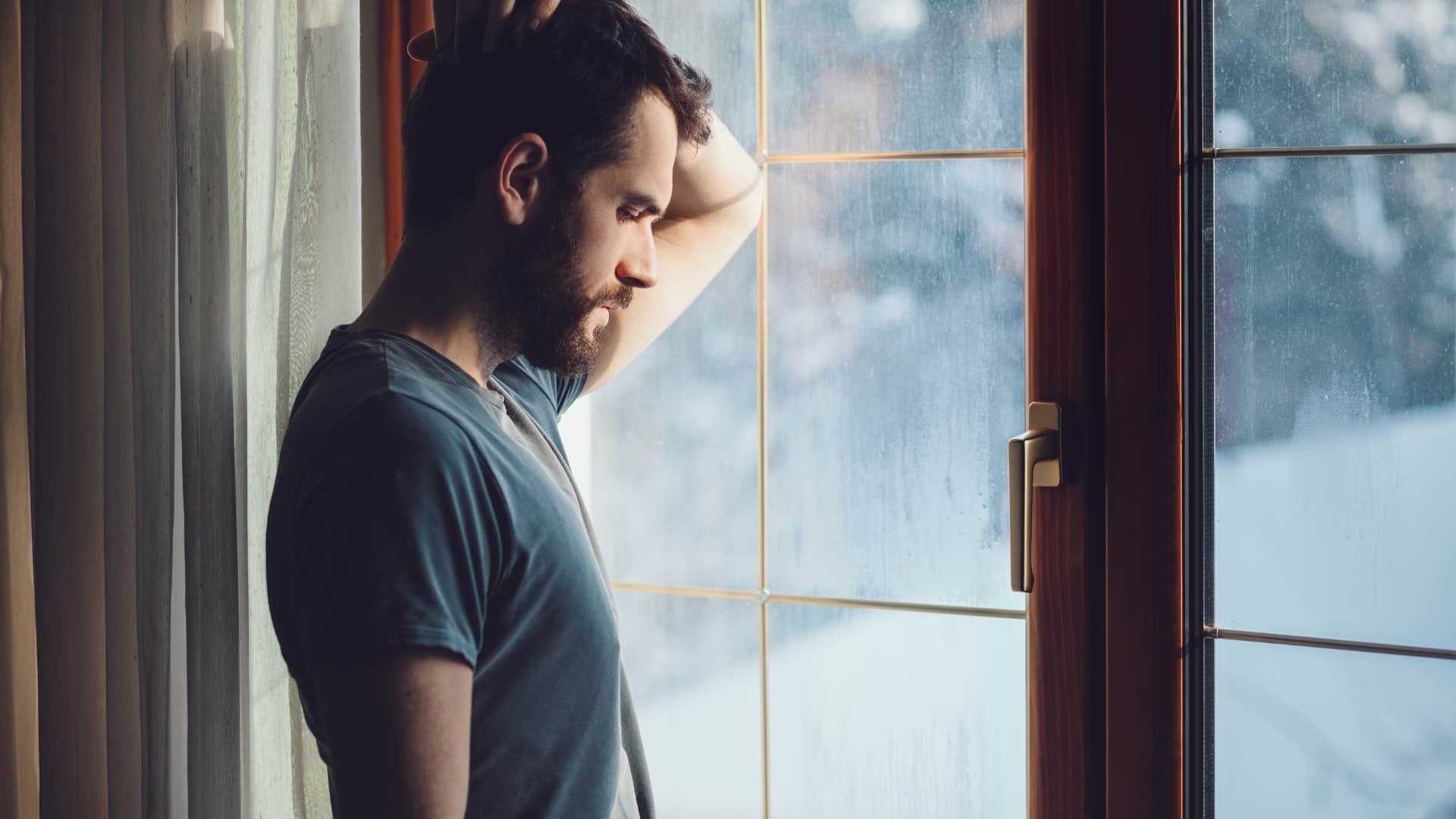 sad man who hasnt unpacked his emotional baggage