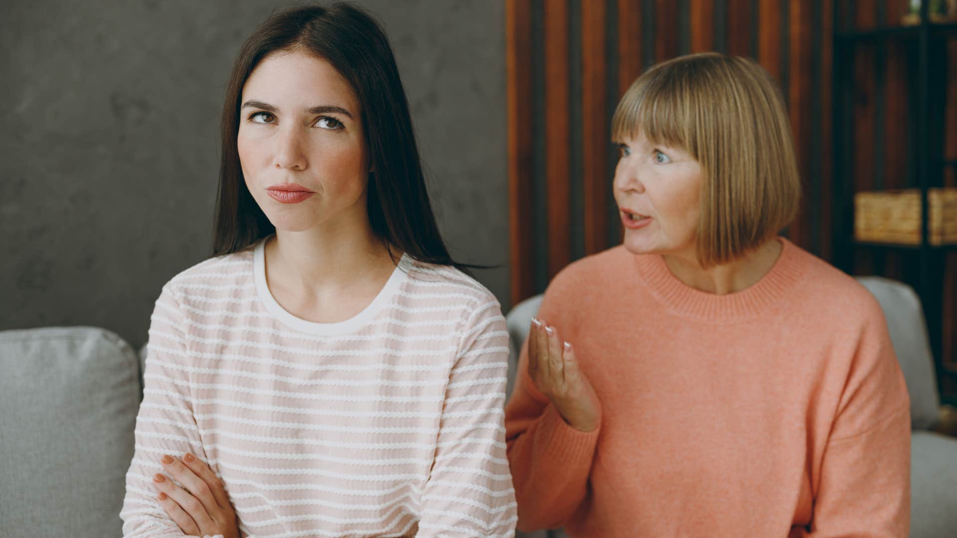 Woman with unresolved childhood trauma arguing with her mother.